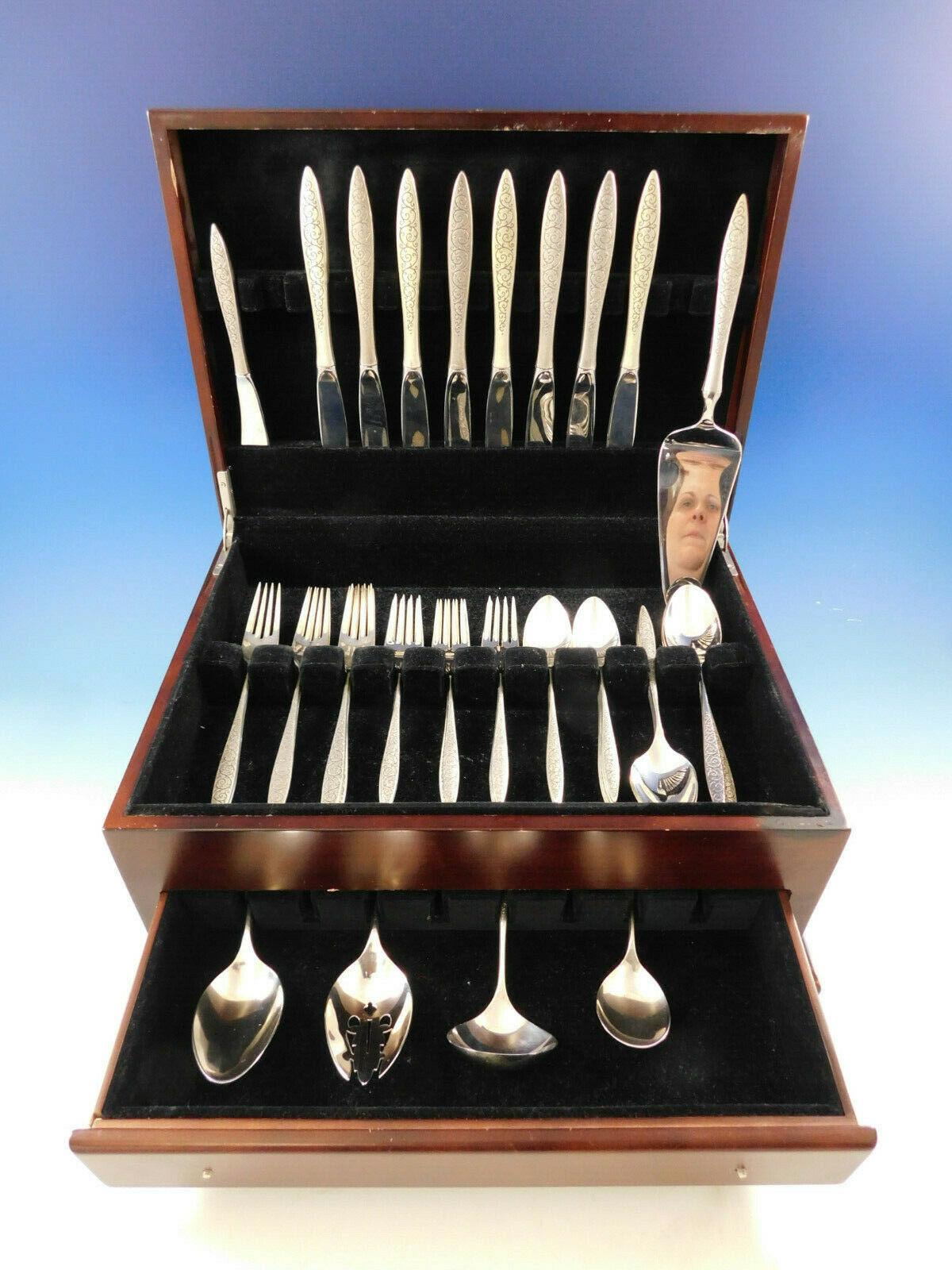 Spanish Lace by Wallace sterling silver flatware set of 46 pieces. This set includes,

8 knives, 9 1/4