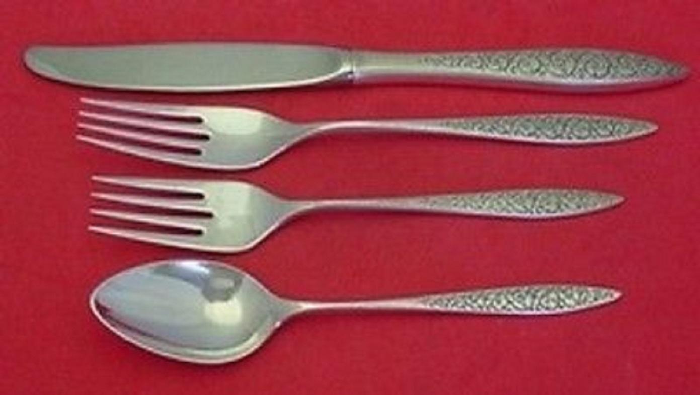 Spanish lace by Wallace sterling silver flatware set, 33 pieces. This set includes:

Eight knives, 9 1/4