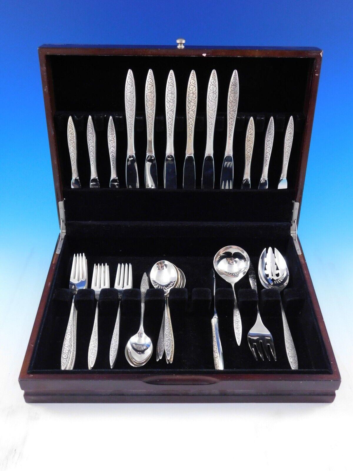 Spanish Lace by Wallace Sterling Silver flatware set - 40 pieces. This set includes:

6 Knives, 9 1/4
