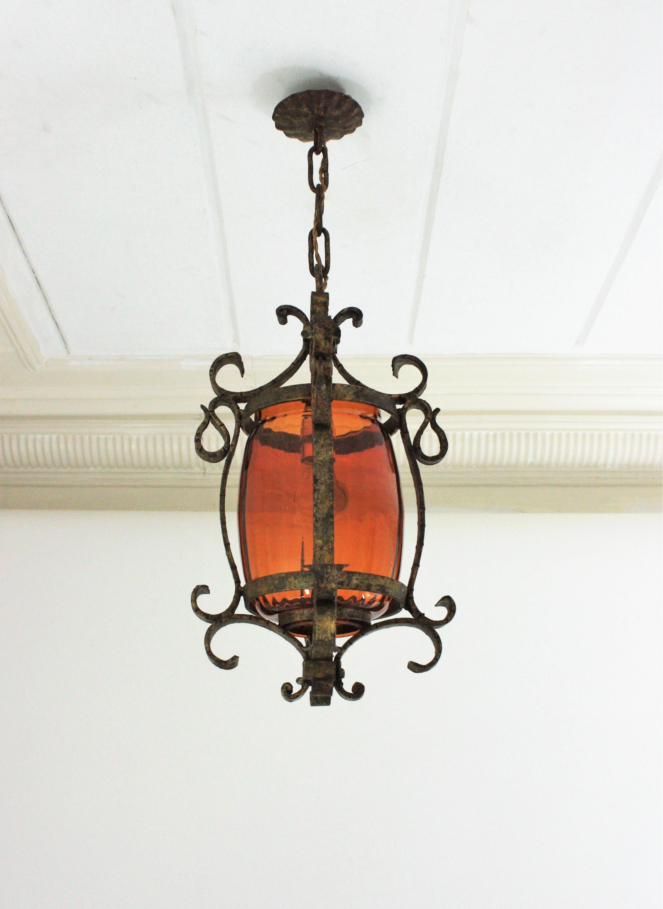 20th Century Spanish Wrought Lantern or Pendant Lamp, Gilt Iron and Amber Glass, 1940s For Sale