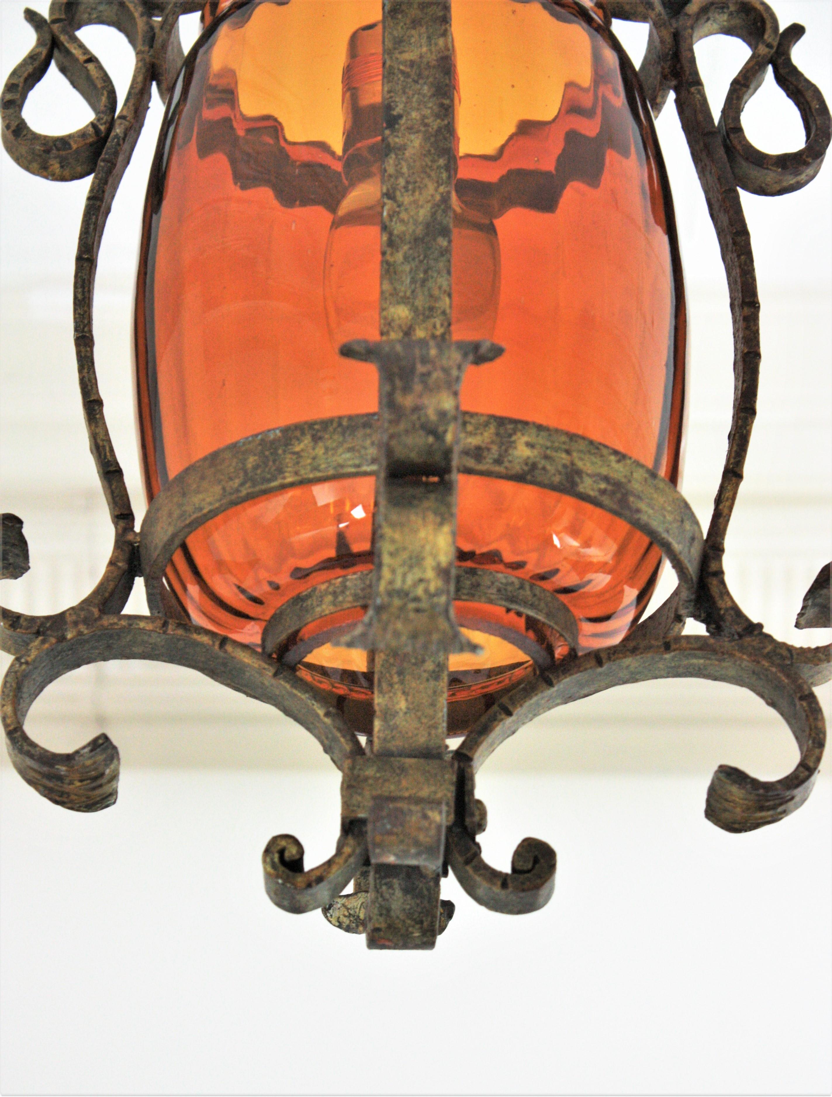 Spanish Wrought Lantern or Pendant Lamp, Gilt Iron and Amber Glass, 1940s For Sale 2