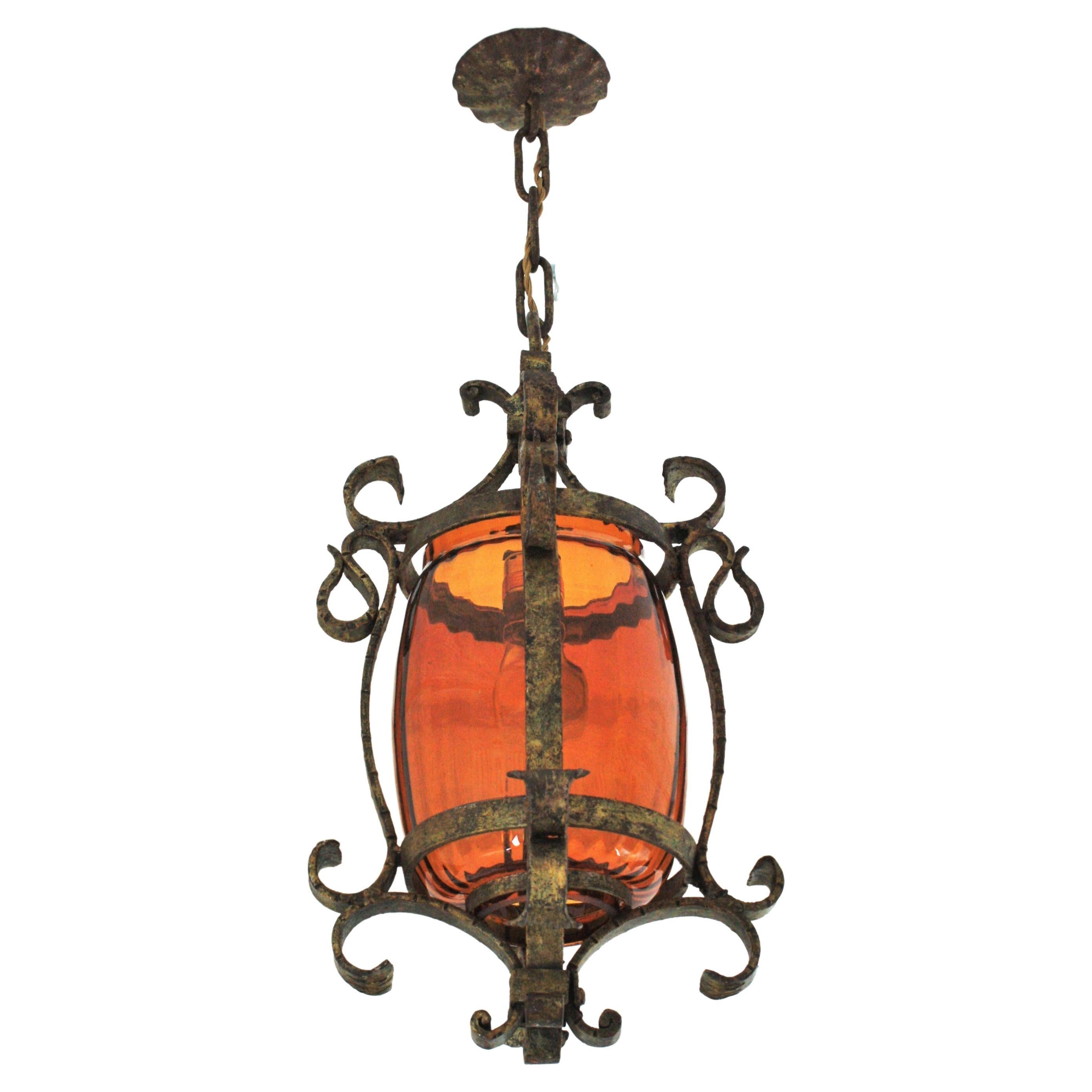 Spanish Lantern or Pendant Lamp in Hand Forged Gilt Iron and Amber Glass