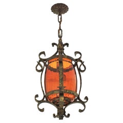 Spanish Lantern or Pendant Lamp in Hand Forged Gilt Iron and Amber Glass