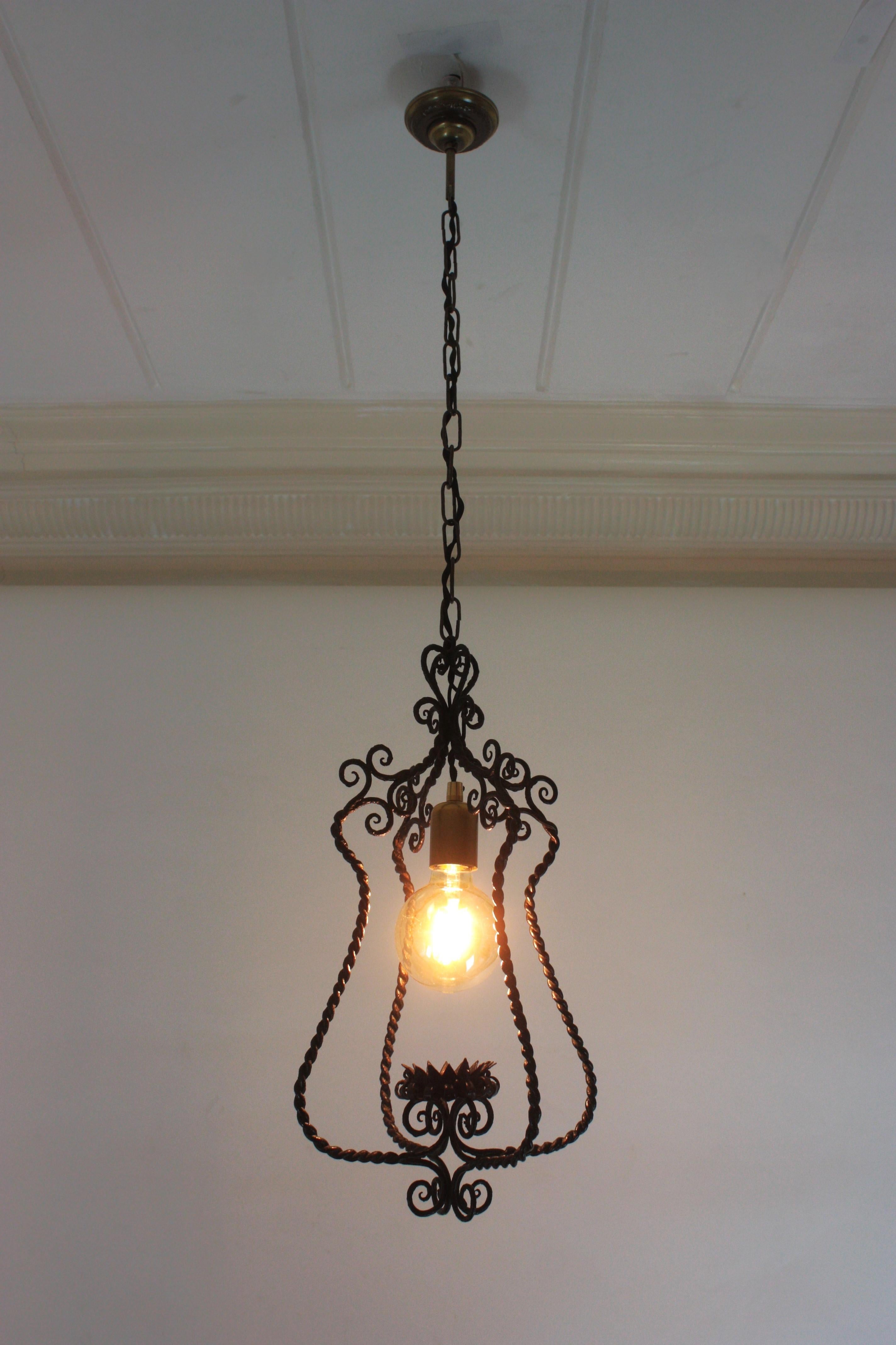 Forged Spanish Lantern Pendant Lamp in Wrought Iron, Scroll Twisting Design, 1940s For Sale