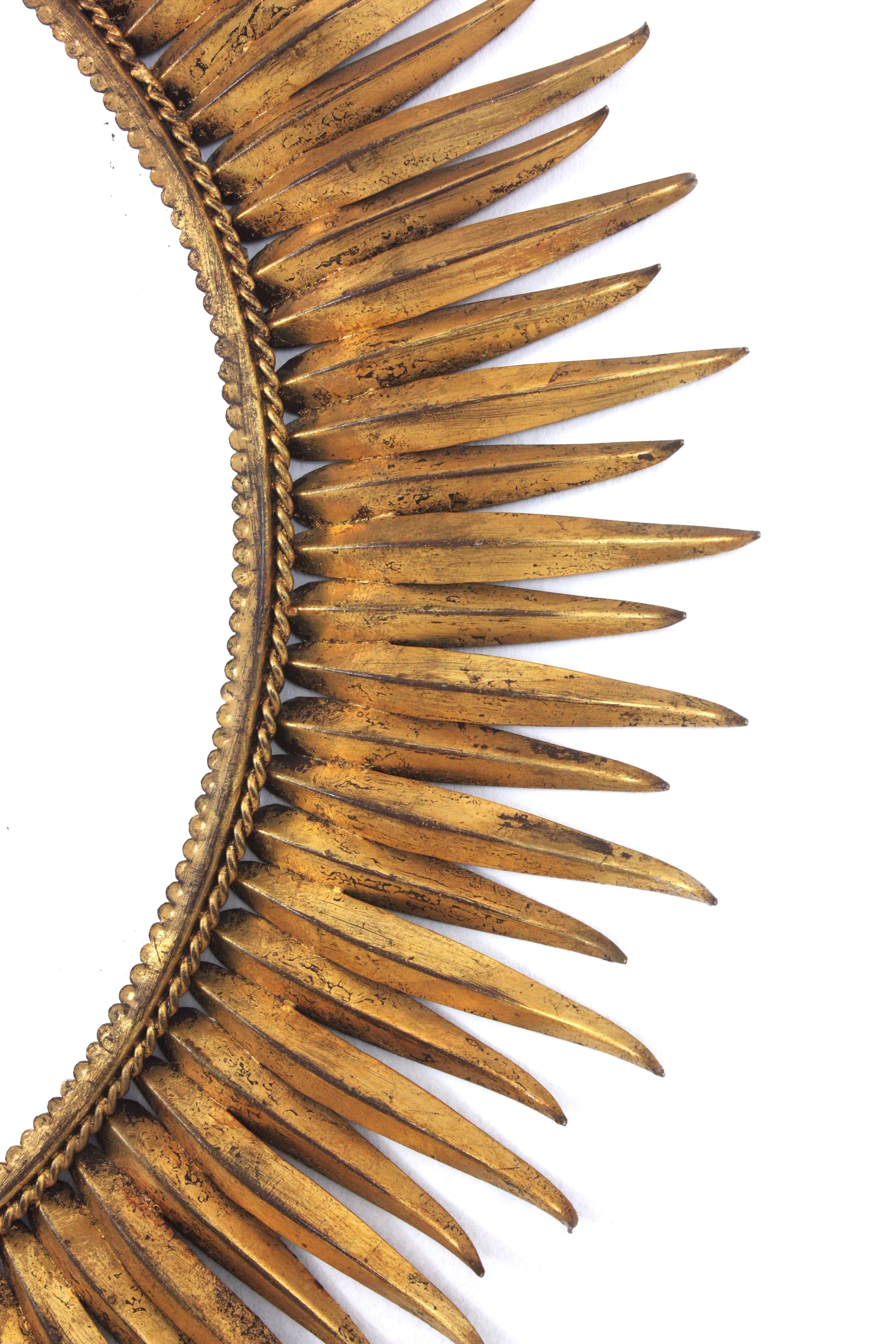 Hand-Crafted Spanish Large Sunburst Eyelash Mirror in Gilt Wrought Iron For Sale