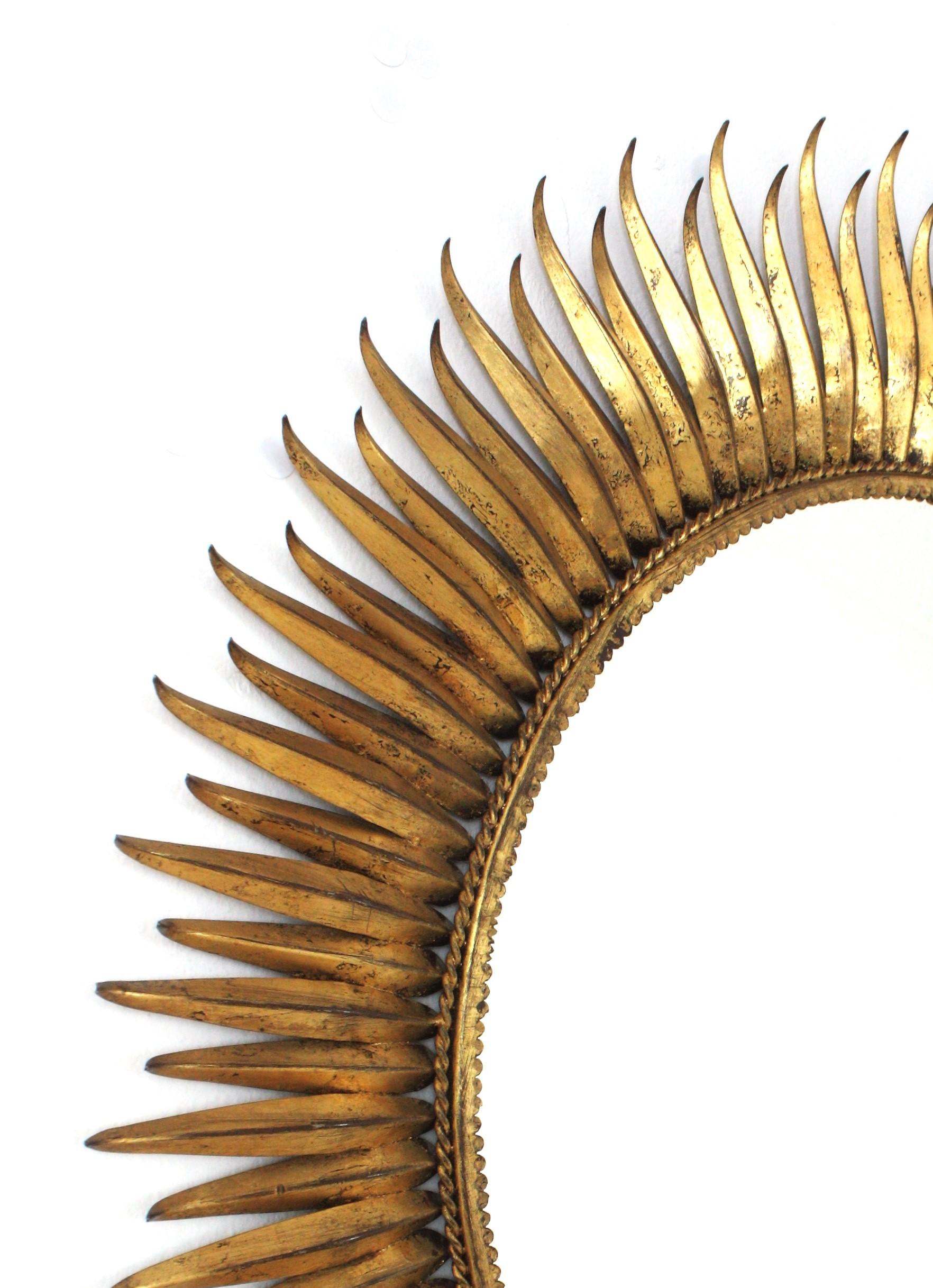 20th Century Spanish Large Sunburst Eyelash Mirror in Gilt Wrought Iron For Sale