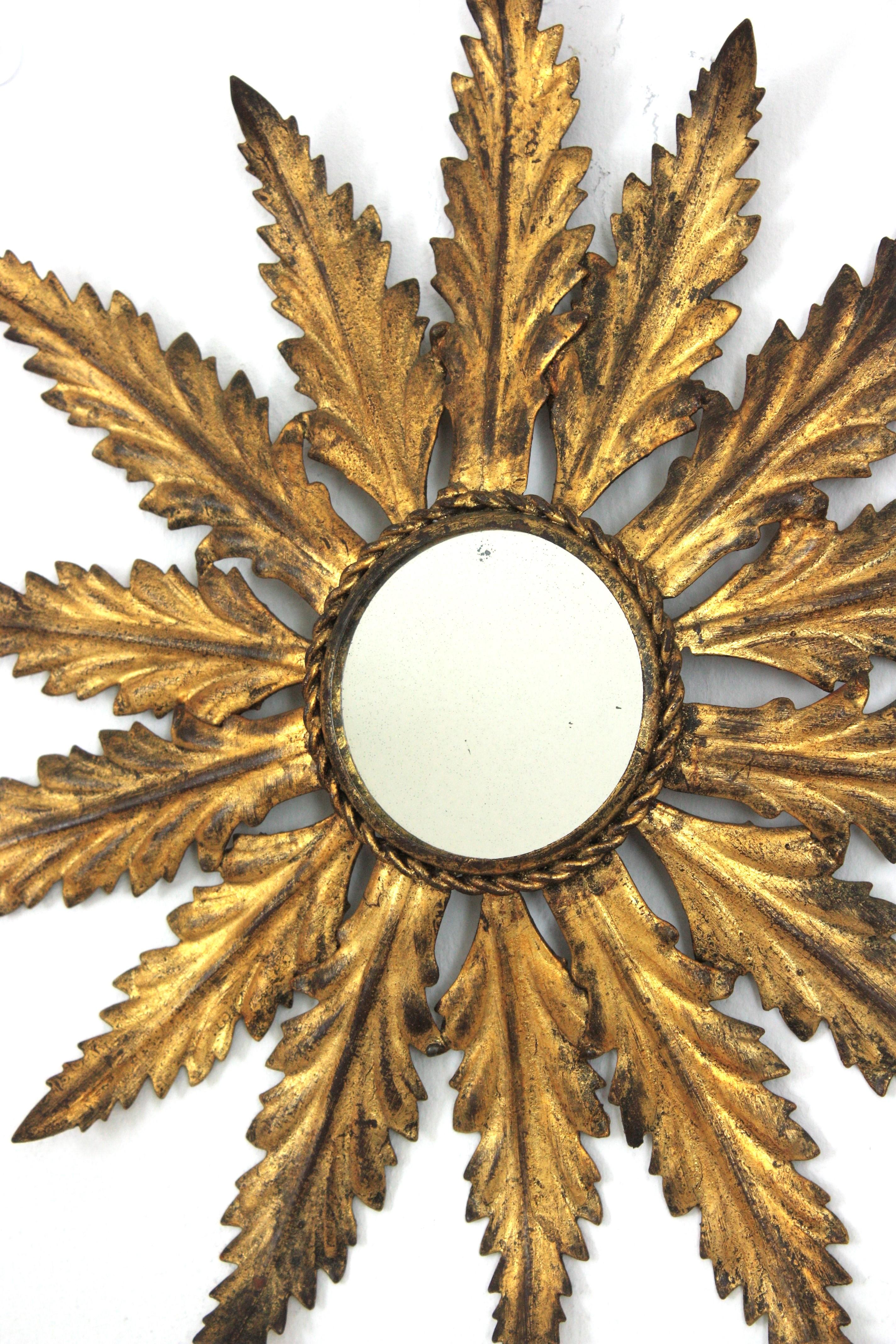 Hand-Crafted Spanish Leafed Sunburst Mirror in Gilt Metal, 1940s For Sale