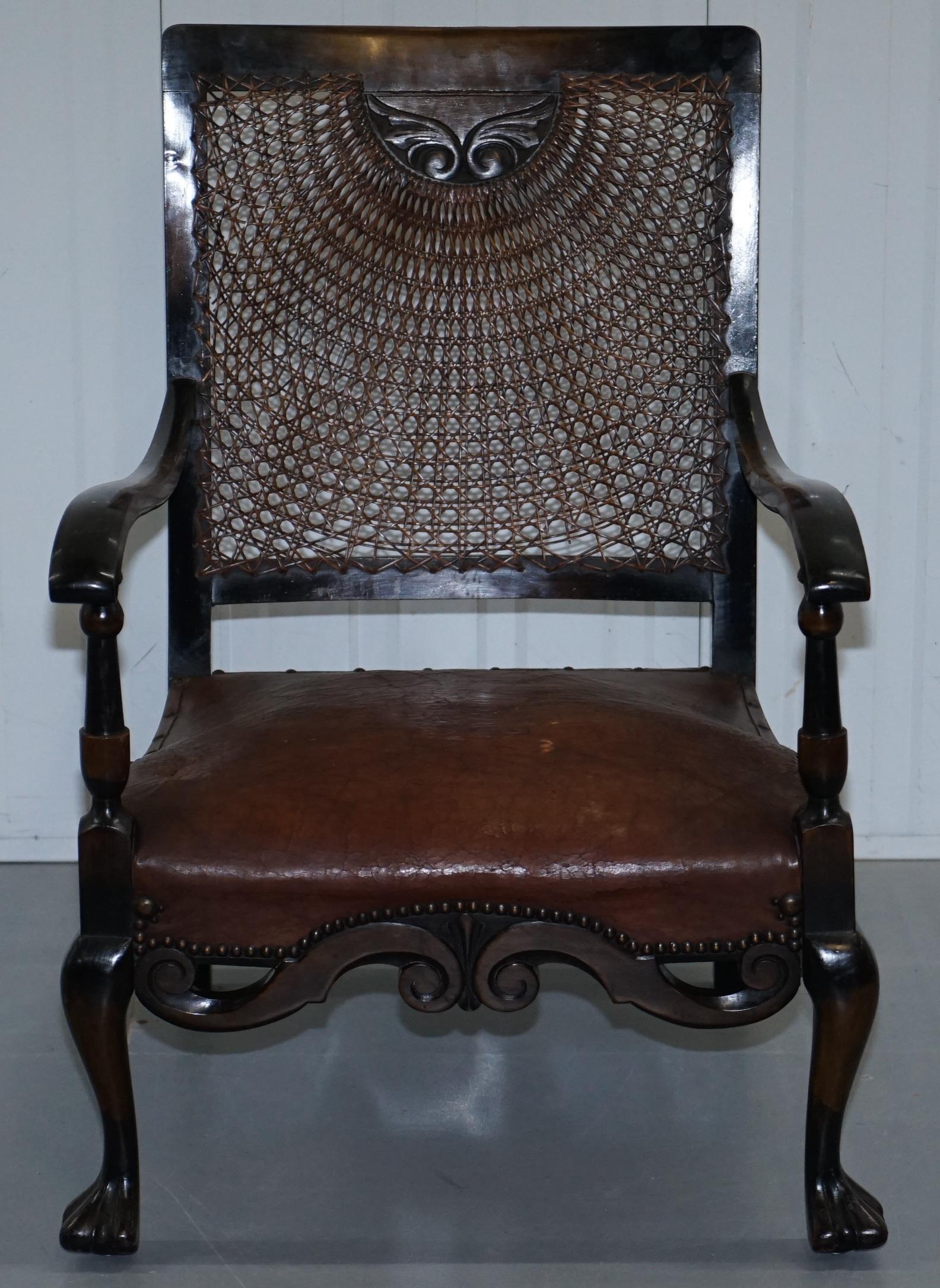 We are delighted to offer for sale is this circa 1910 original Spanish mahogany and brown leather open armchair

Please note the delivery fee listed is just a guide, it covers within the M25 only

A very comfortable rattan armchair, everything