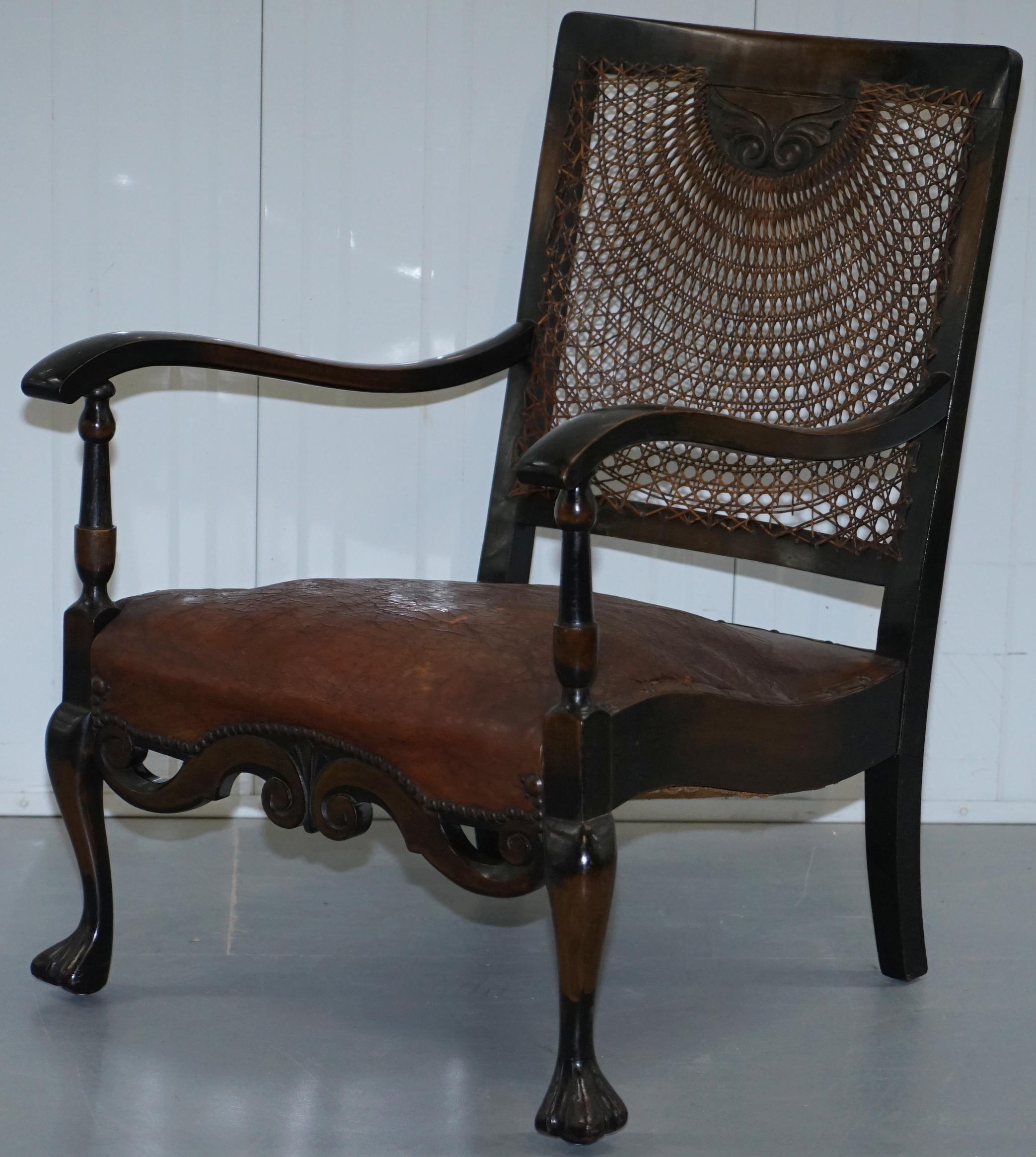 Spanish Colonial Spanish Mahogany and Brown Leather Open Library Readying Armchair, circa 1910
