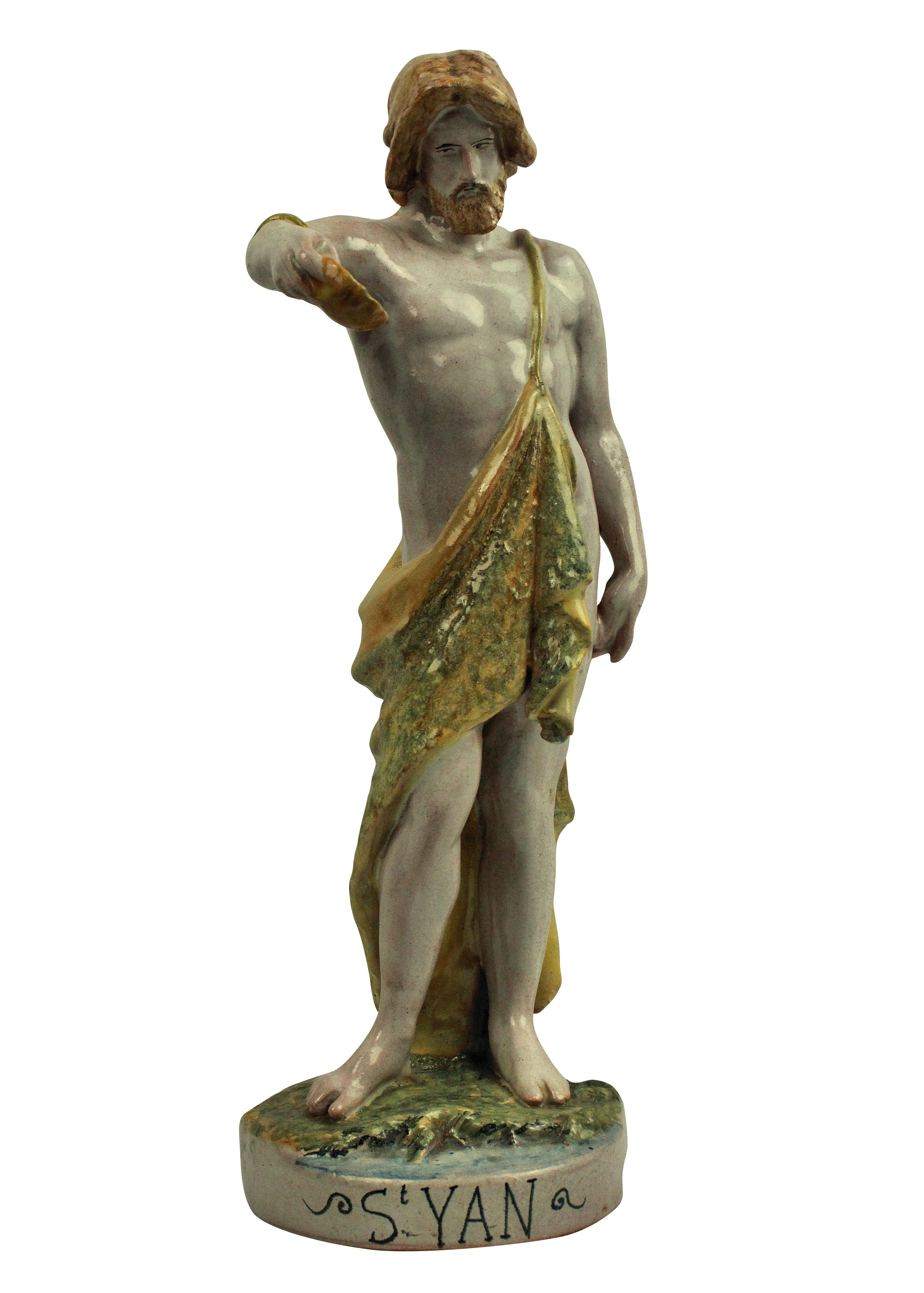 A Spanish (Catalan) tin glazed Majolica statue of St. John the Baptist.