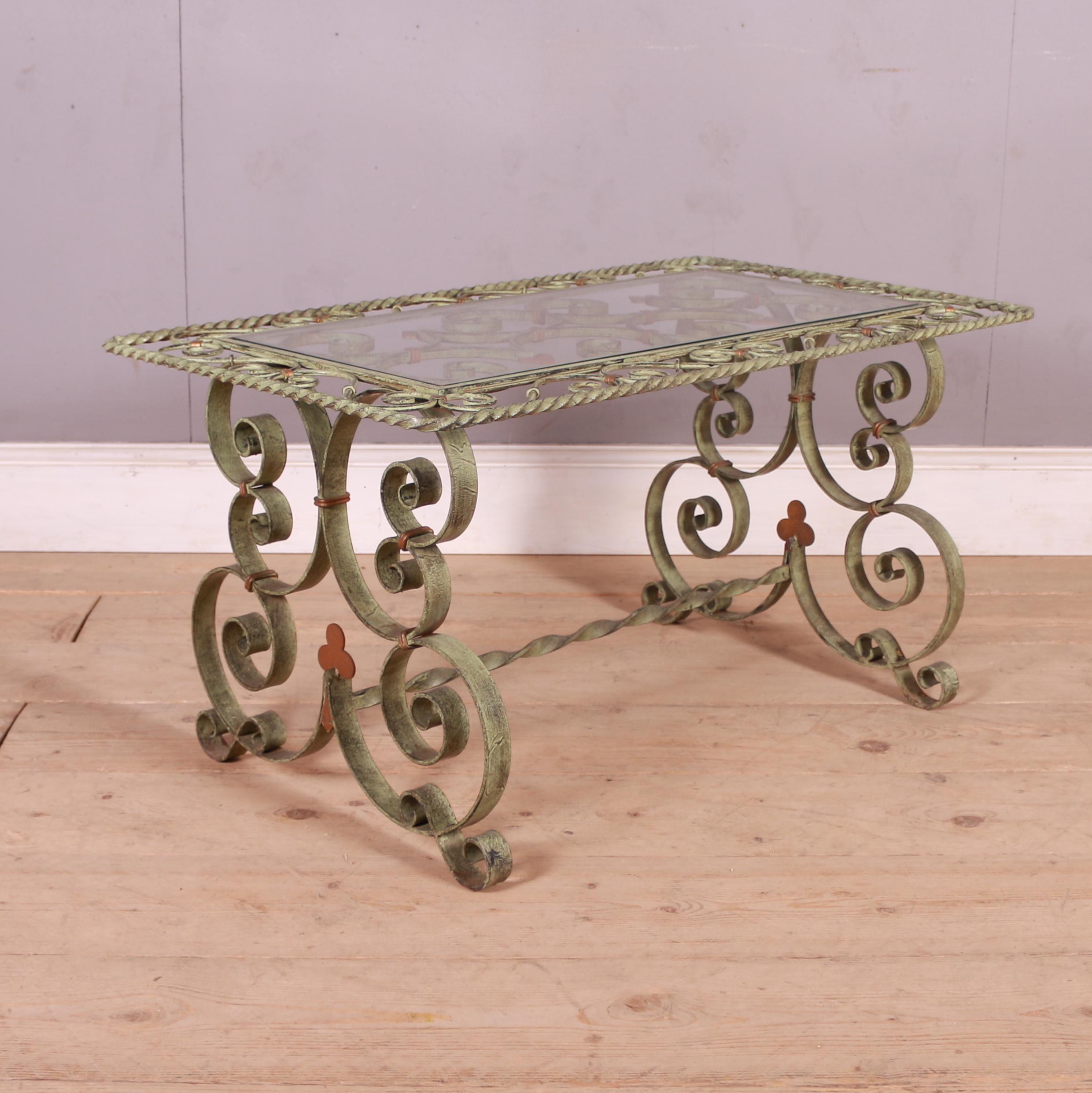 Decorative 20th C Spanish metal coffee table with glass insert.
The glass area is 75cm x 34cm.

Dimensions
38 inches (97 cms) wide
22 inches (56 cms) deep
19.5 inches (50 cms) high.

    