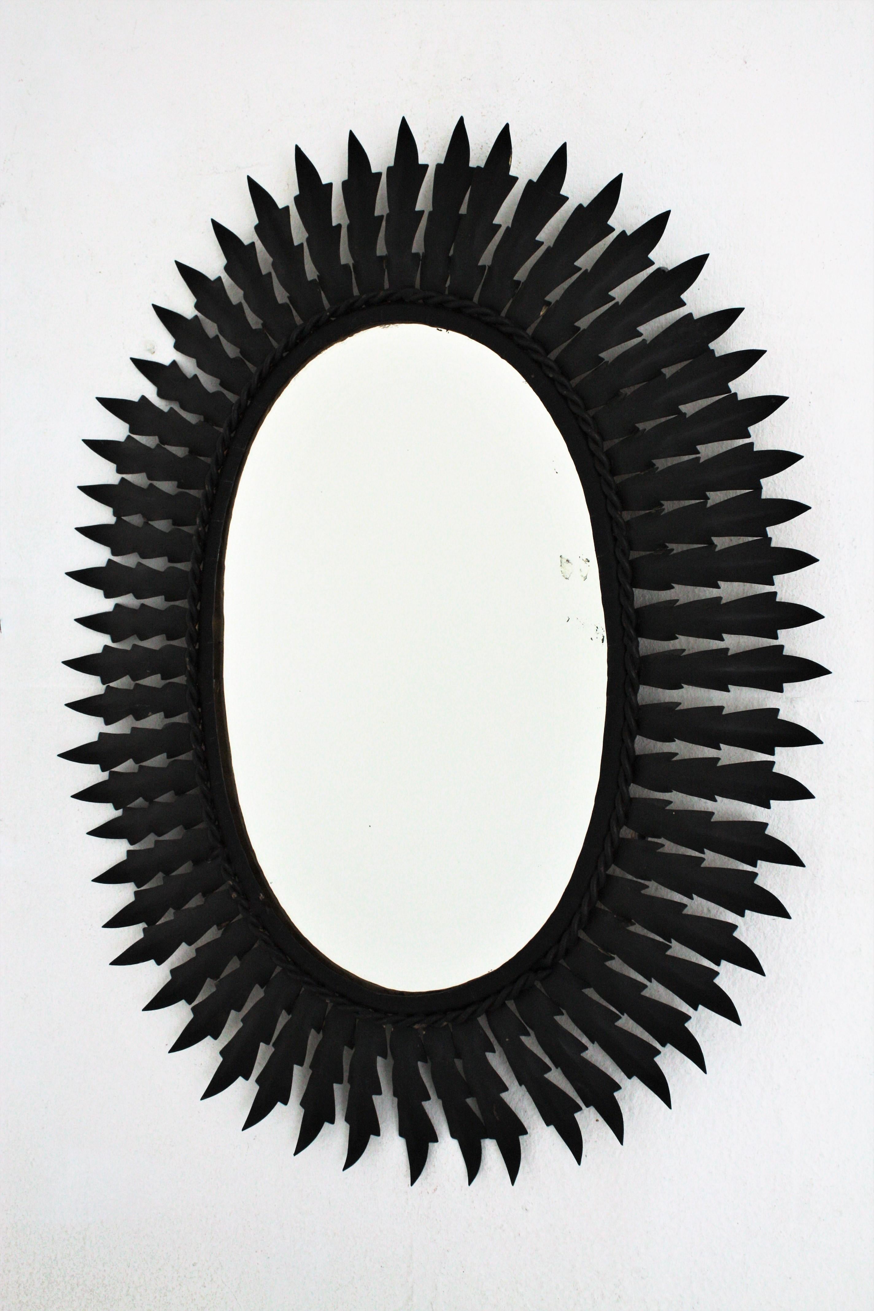 Spanish Metal Sunburst Oval Mirror Painted in Black, 1960s 2