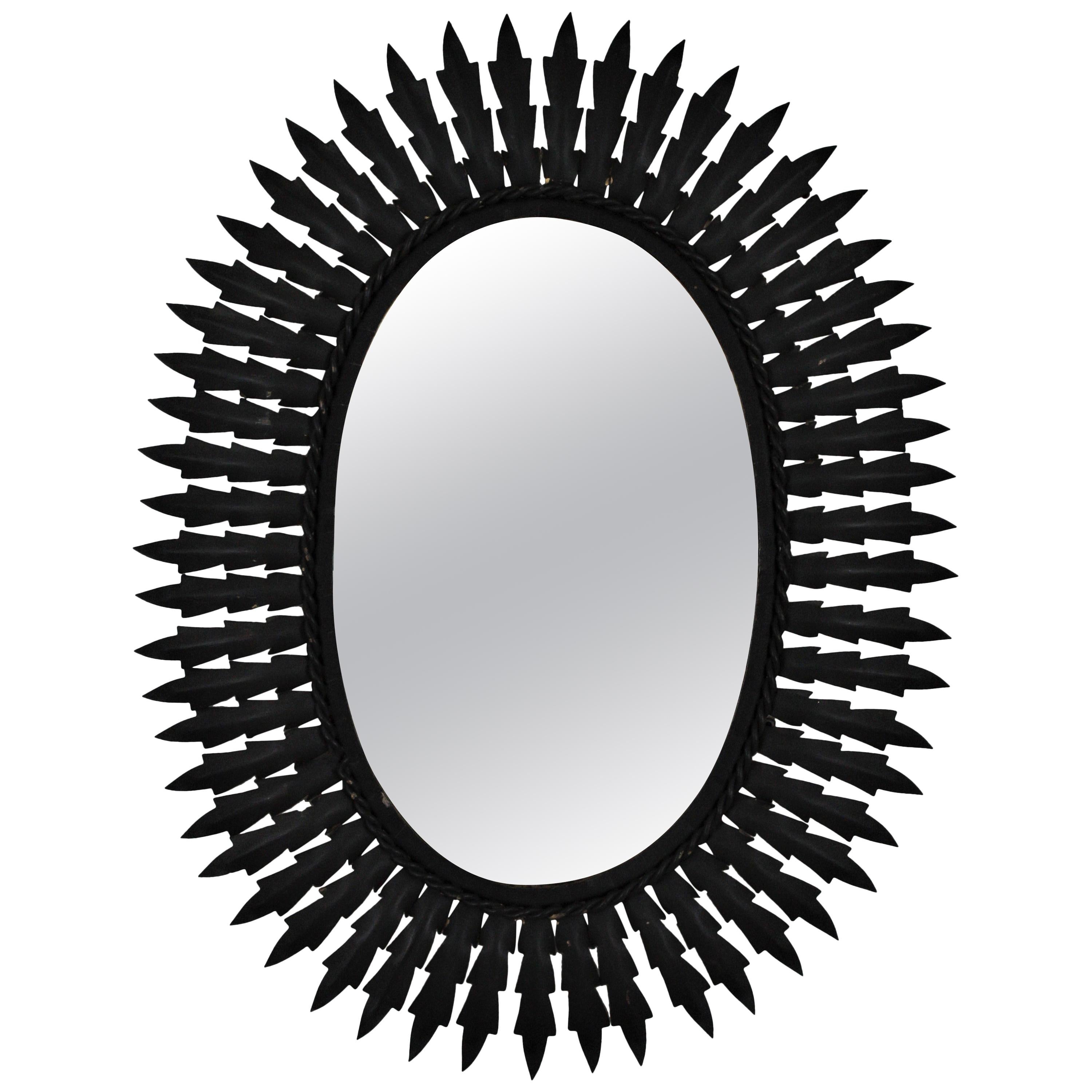 Spanish Metal Sunburst Oval Mirror Painted in Black, 1960s