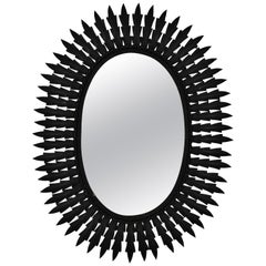 Specchio ovale spagnolo in metallo verniciato di nero, anni '60