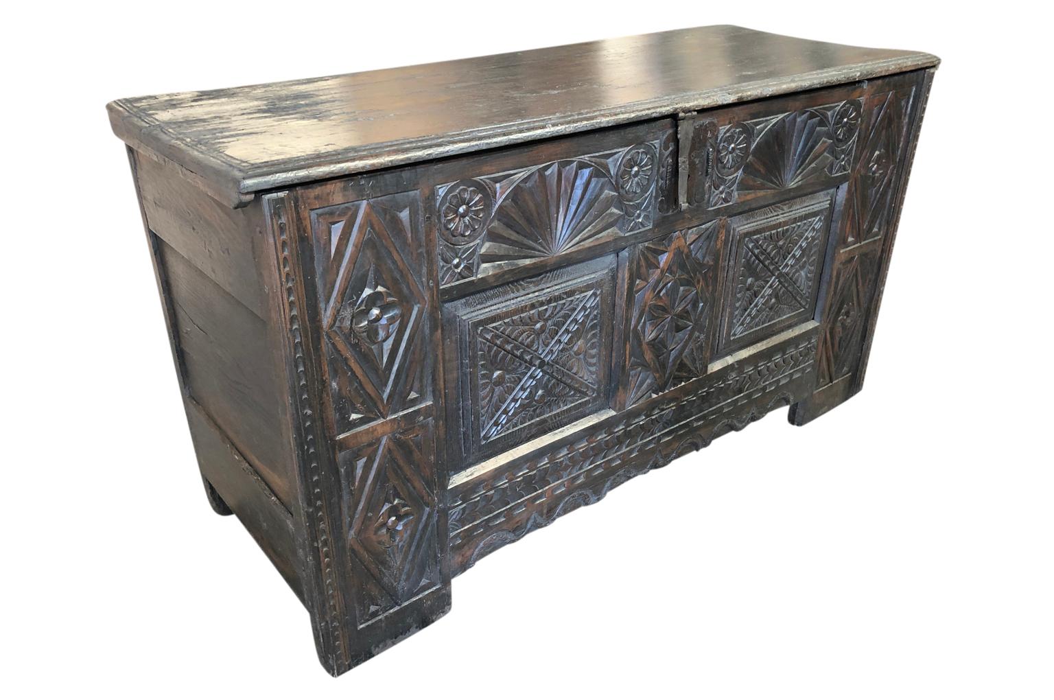 A very handsome mid-18th century trunk - coffre from the Catalan region of Spain. Soundly constructed from oak, richly stained and with wonderful carving detail. A terrific storage piece.