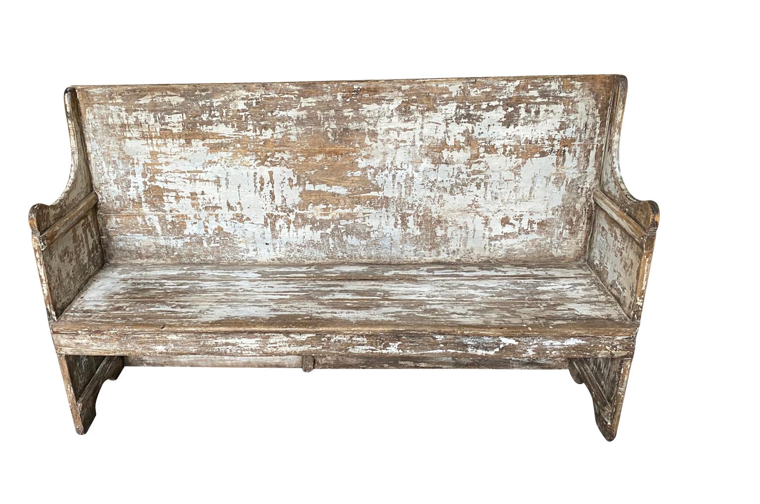 A rustic mid-19th century Banquette - Bench from the Catalan region of Spain.  Soundly constructed from sturdy painted wood.  Terrific patina and finish.  Seat height is 18