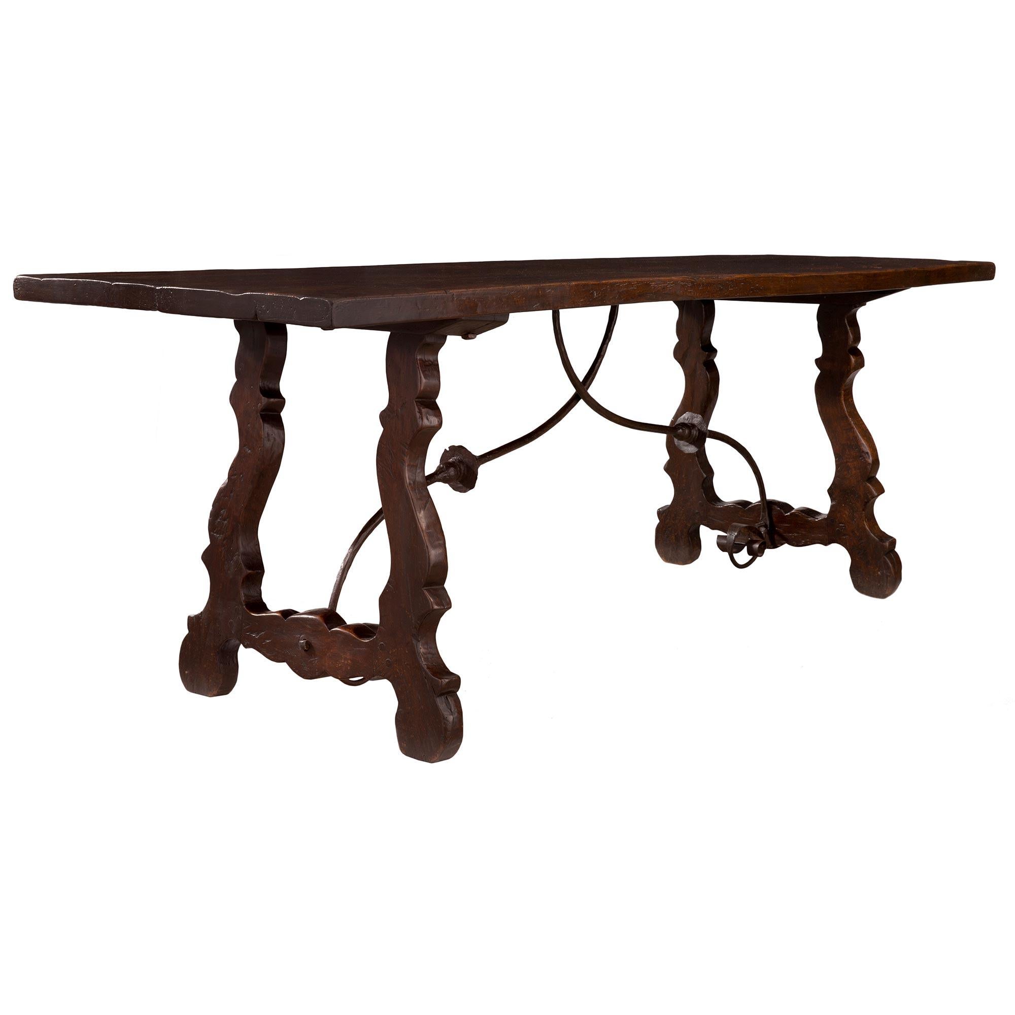 Spanish Mid-19th Century Country Style Dark Oak Trestle Dining/Center Table In Good Condition For Sale In West Palm Beach, FL
