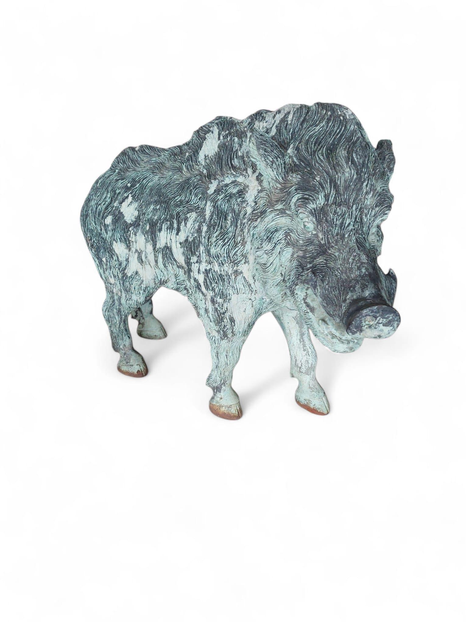 An extraordinary Spanish bronze sculpture from the 1950s, depicting a powerful wild boar in a bold and lifelike stance. Executed with remarkable detail, the piece captures the animal’s textured fur, muscular build, and expressive features with