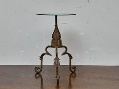 Table espagnole en fer doré du milieu du siècle avec pieds à volutes et plateau en miroir