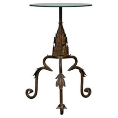 Table espagnole en fer doré du milieu du siècle avec pieds à volutes et plateau en miroir