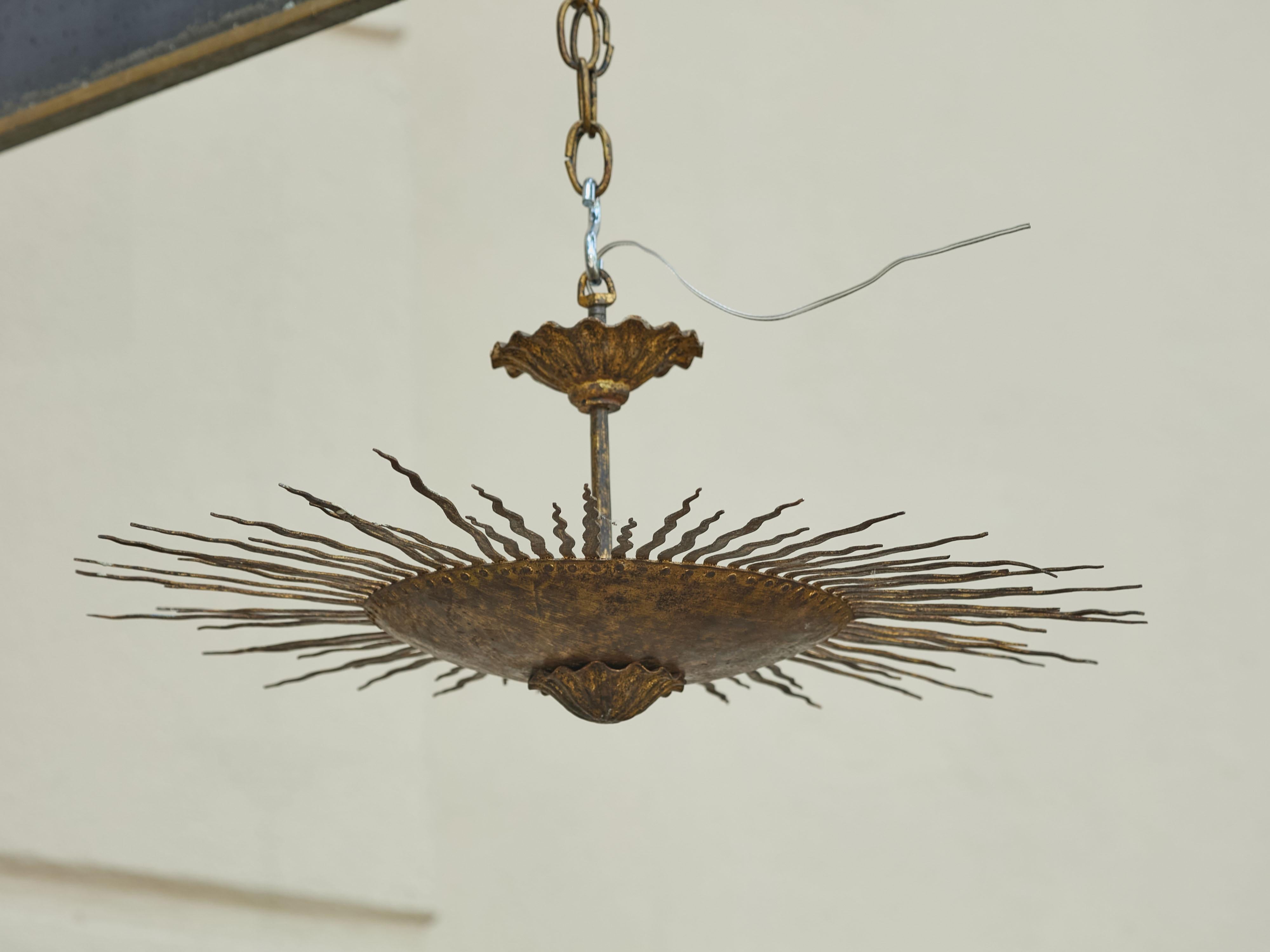 Spanish Midcentury Gilt Metal Sunburst Chandelier with Wavy Rays, USA Wired In Good Condition For Sale In Atlanta, GA