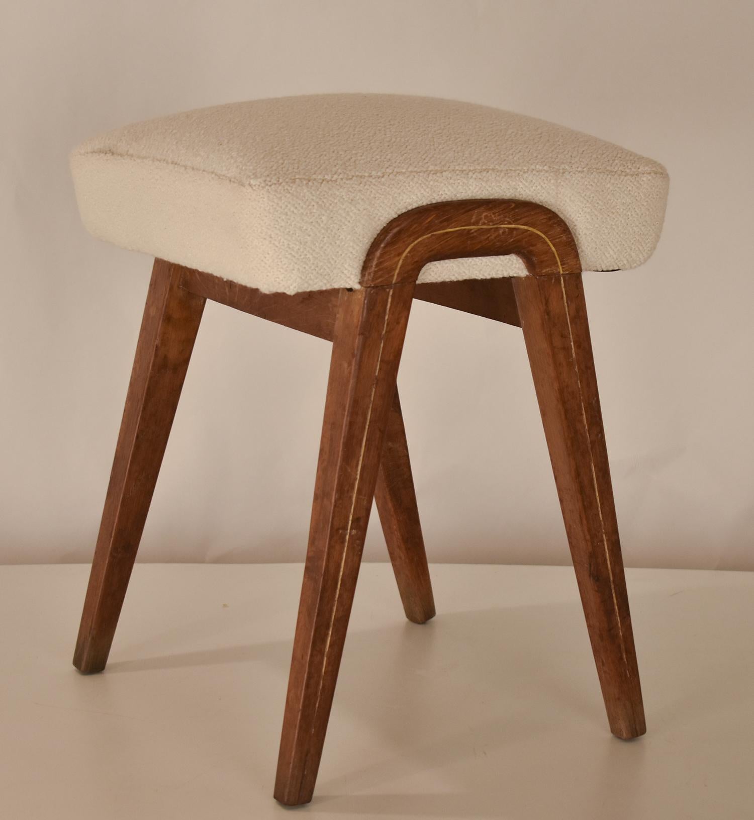 Spanish stool in white fabric oak wood.
1960's.
The upholstery is new.