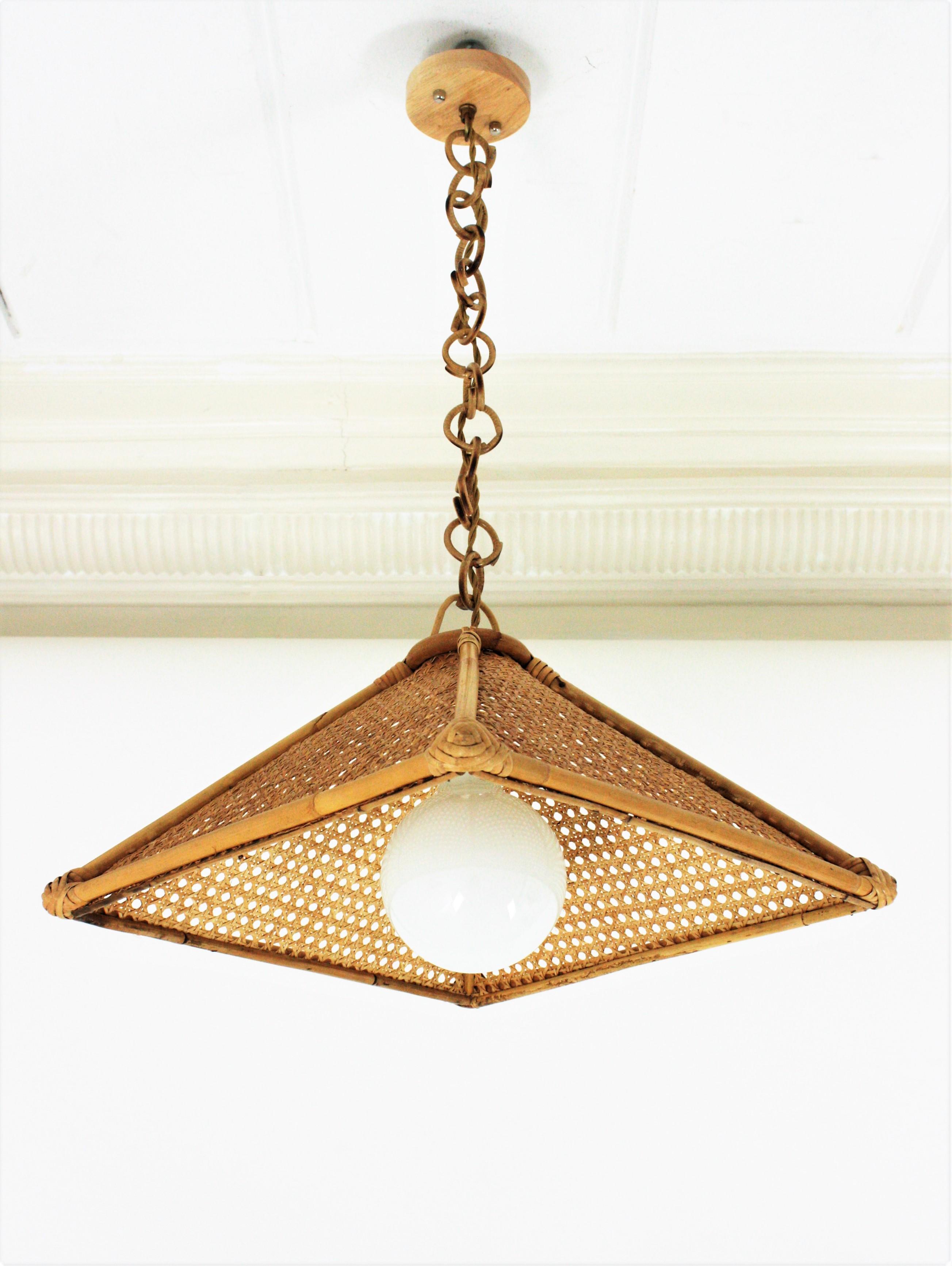 Cane Spanish Modern Rattan and Wicker Wire Trapezoid Pendant Hanging Light, 1960s For Sale