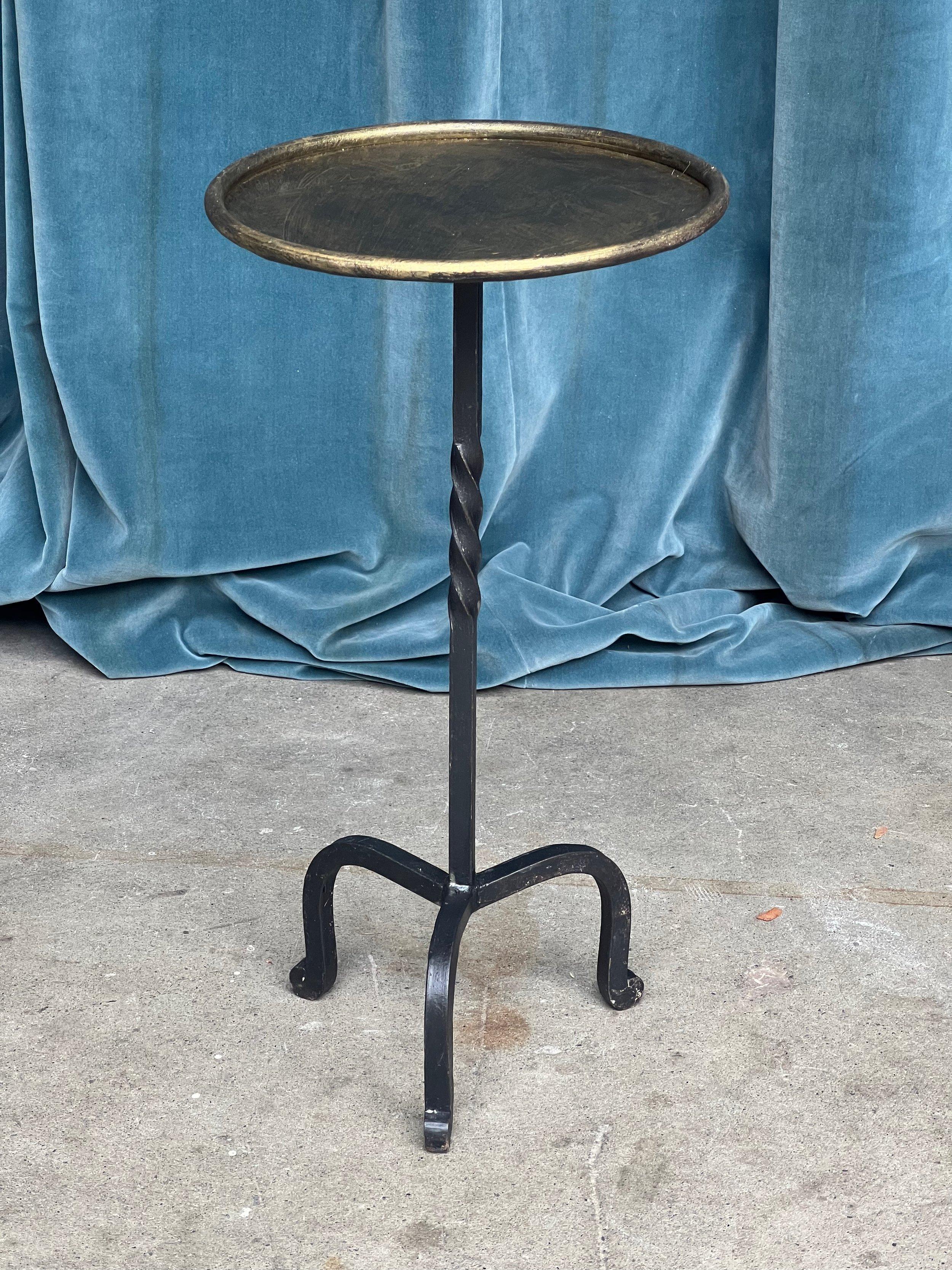 This modern-style Spanish drinks table masterfully blends contrasting elements of contemporary and traditional design. Based on one of our favorite vintage 1950s design, it was recently created by accomplished artisans using traditional iron-working