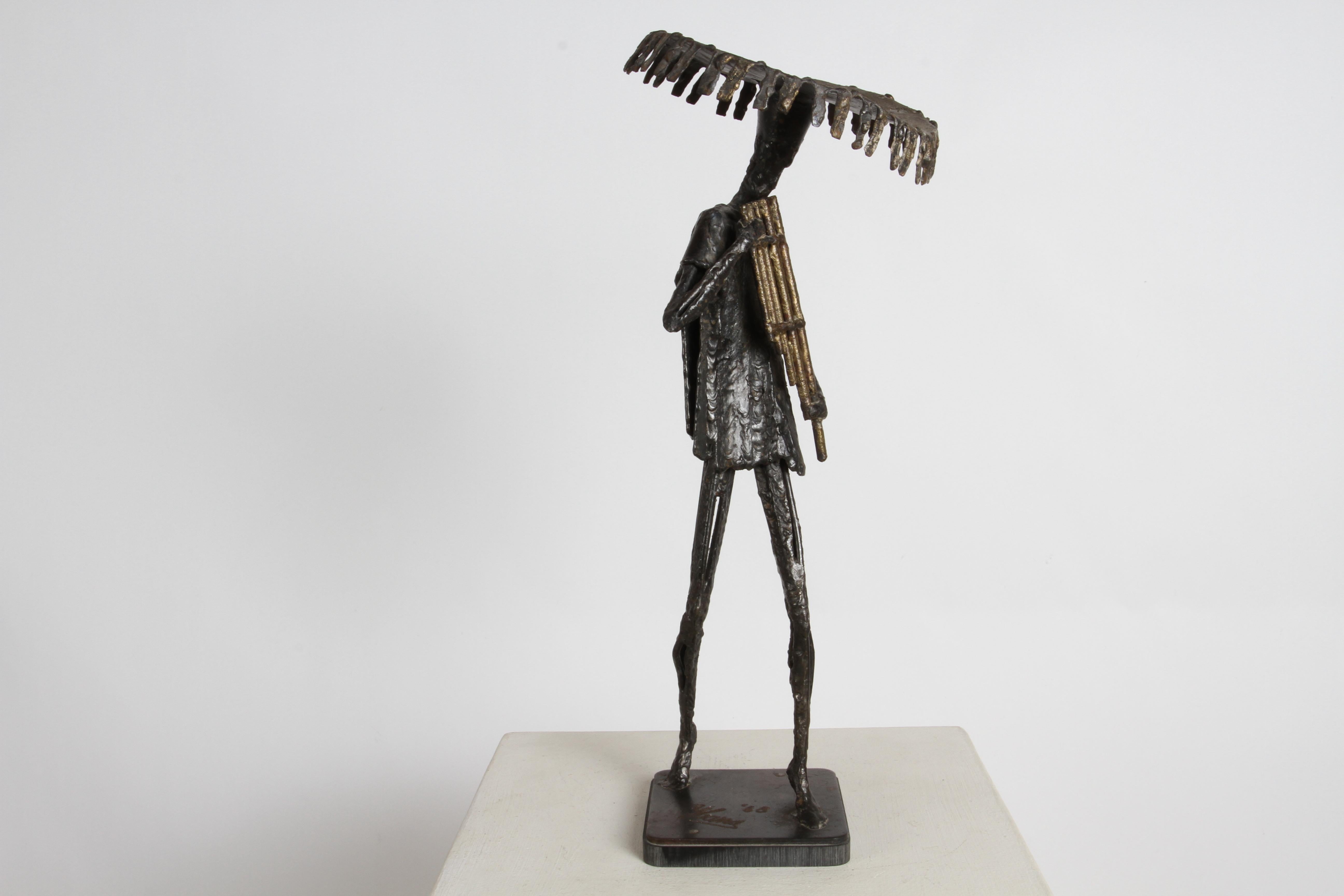 Mid-Century Mexican Modern Brutalist figurative sculpture of a pan flutist with large sombrero by Mexican / American artist Simon Ybarra (1913-2003). Signed on base Ybarra '68. Welded figure with brass brazing holding a pan flute on square base. In