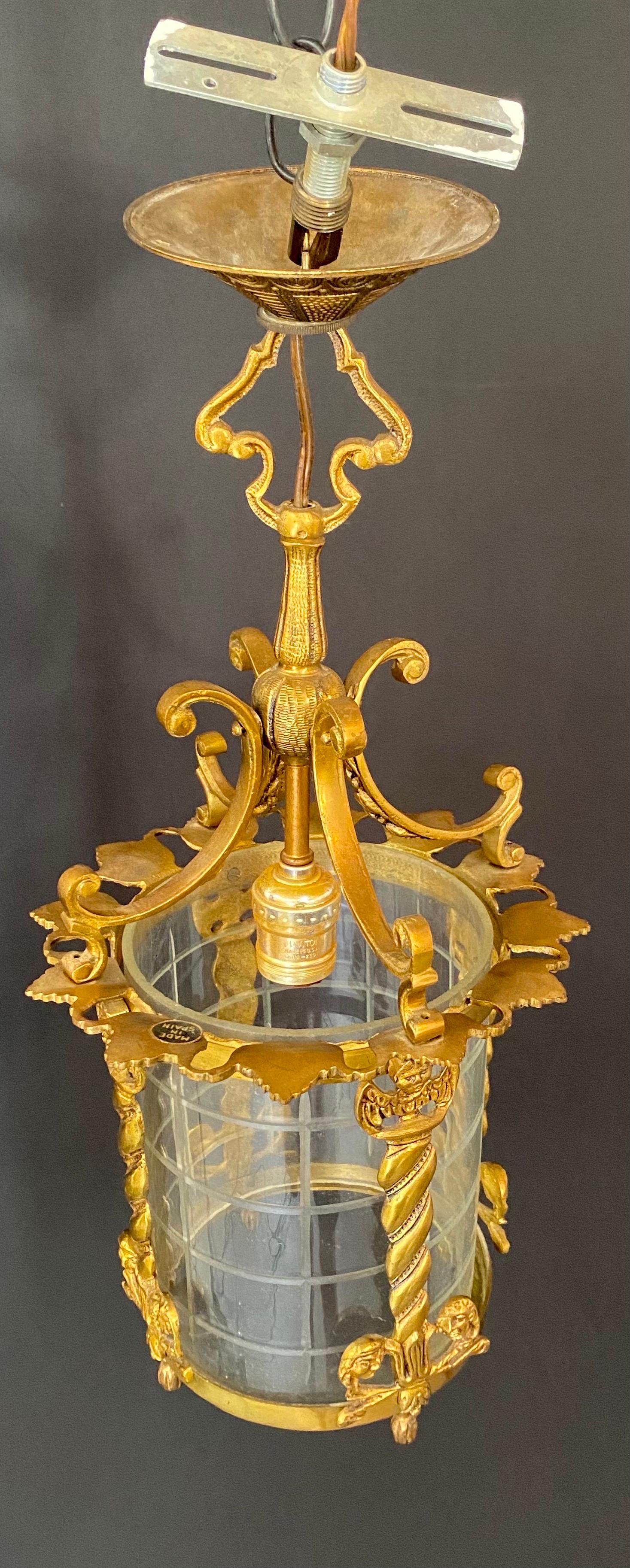 Spanish Neoclassical Revival Style Figural Gilt Iron Lantern or Pendant  In Good Condition For Sale In Plainview, NY