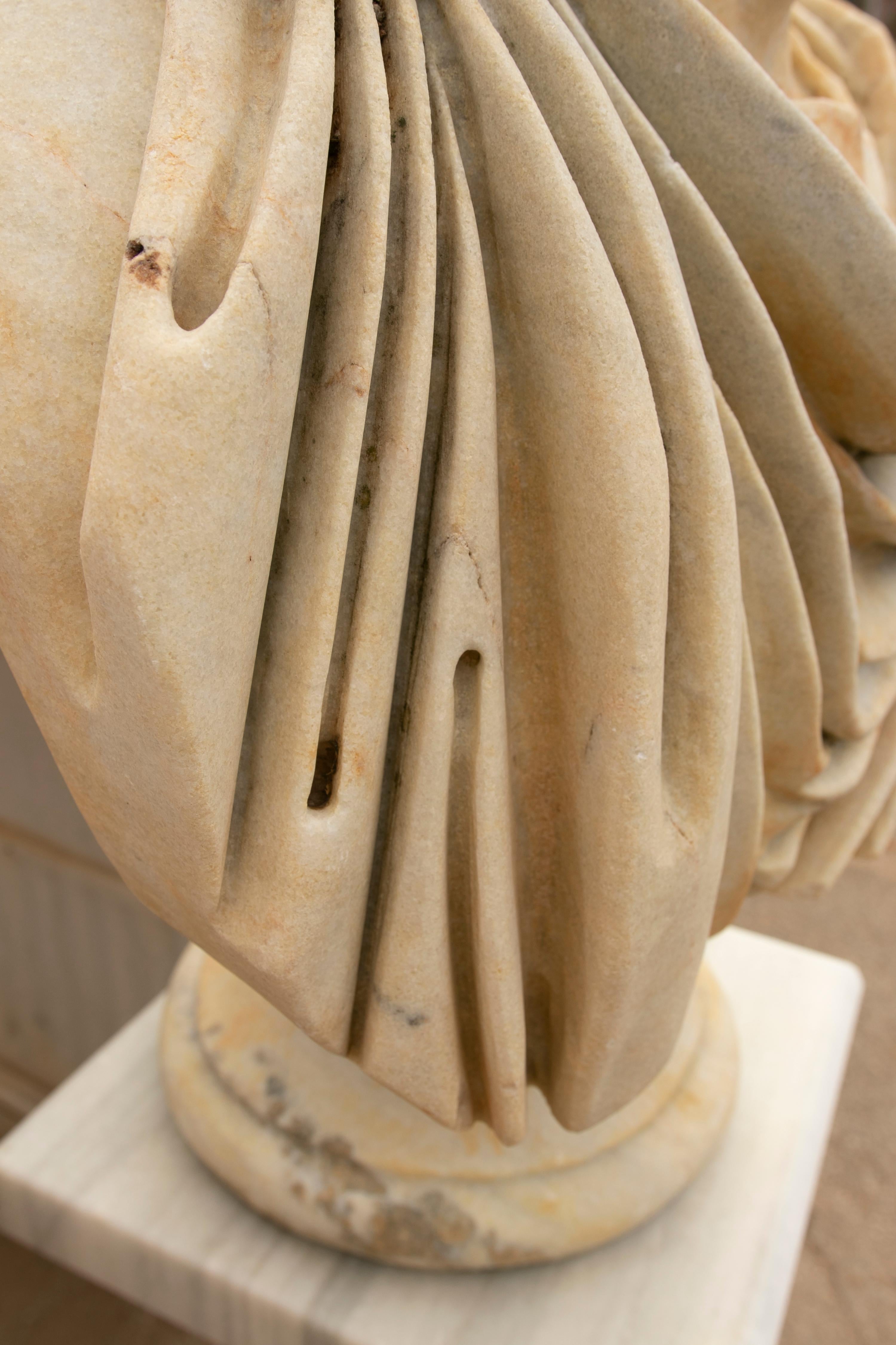 Spanish Neoclassical Style Hand Carved Aged White Marble Bust of Juiious Caesar in vendita 12
