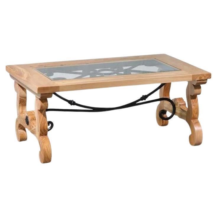 Table basse de designer espagnol en bois d'olivier et fer de style rustique