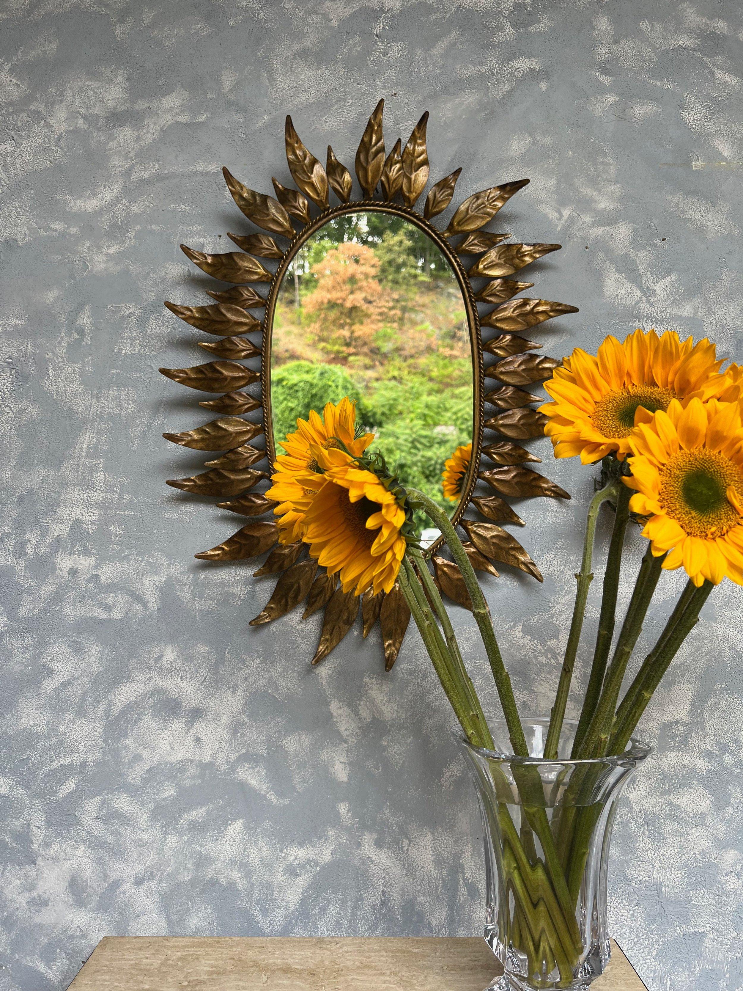 Spanish Oval Gilt Metal Sunburst Mirror With Alternating Leaves In Good Condition For Sale In Buchanan, NY