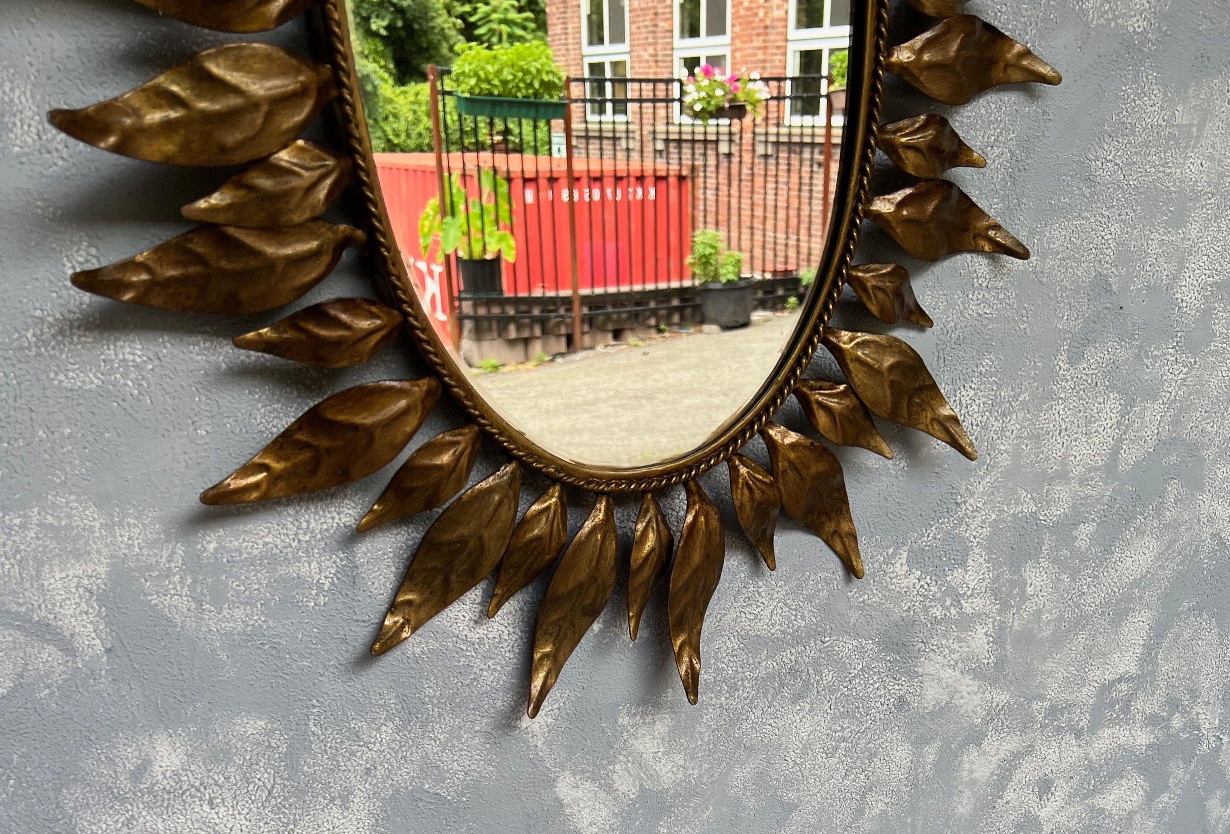 Spanish Oval Gilt Metal Sunburst Mirror With Alternating Leaves For Sale 4
