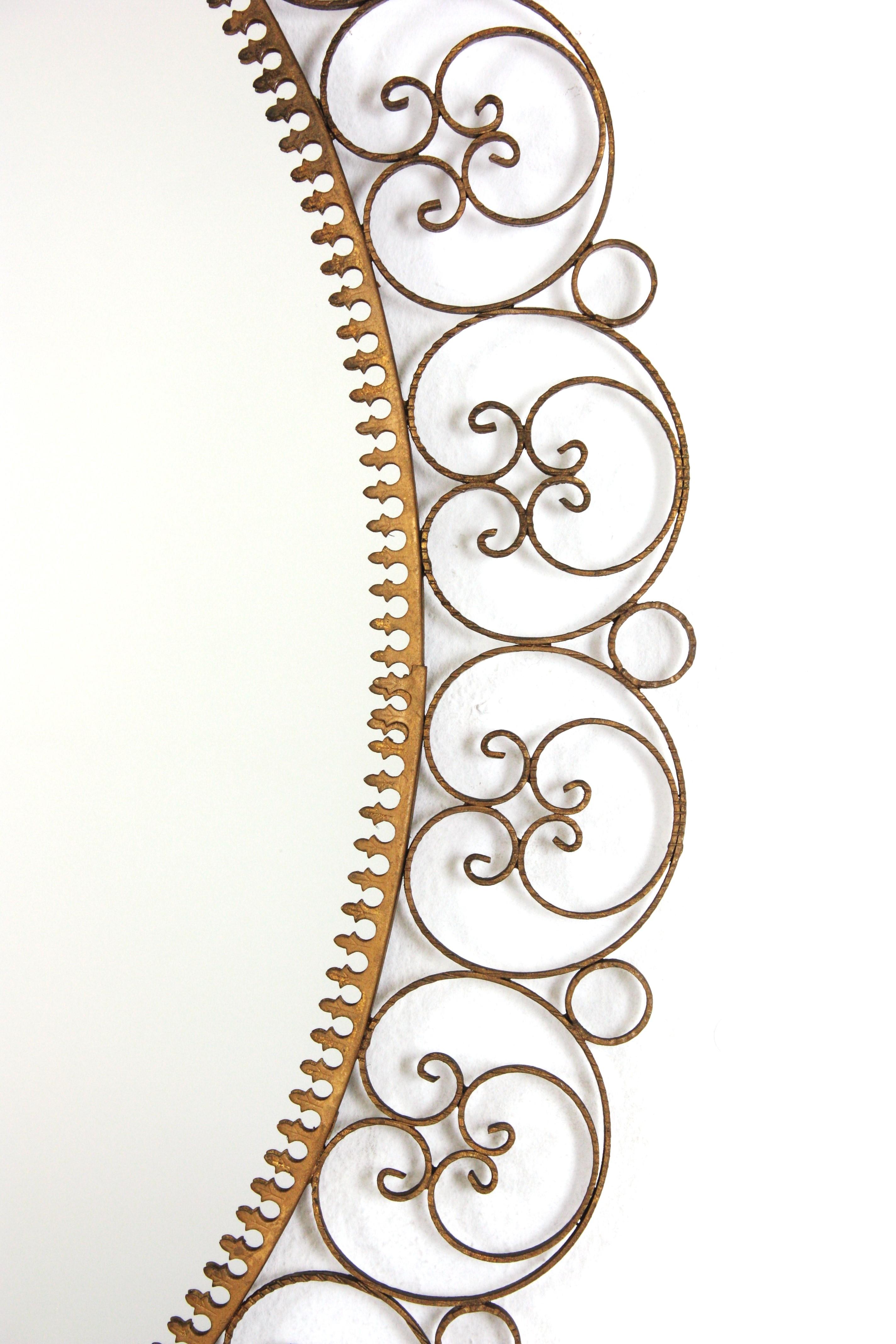 Spanish Oval Mirror in Gilt Iron with Scrollwork Frame For Sale 3