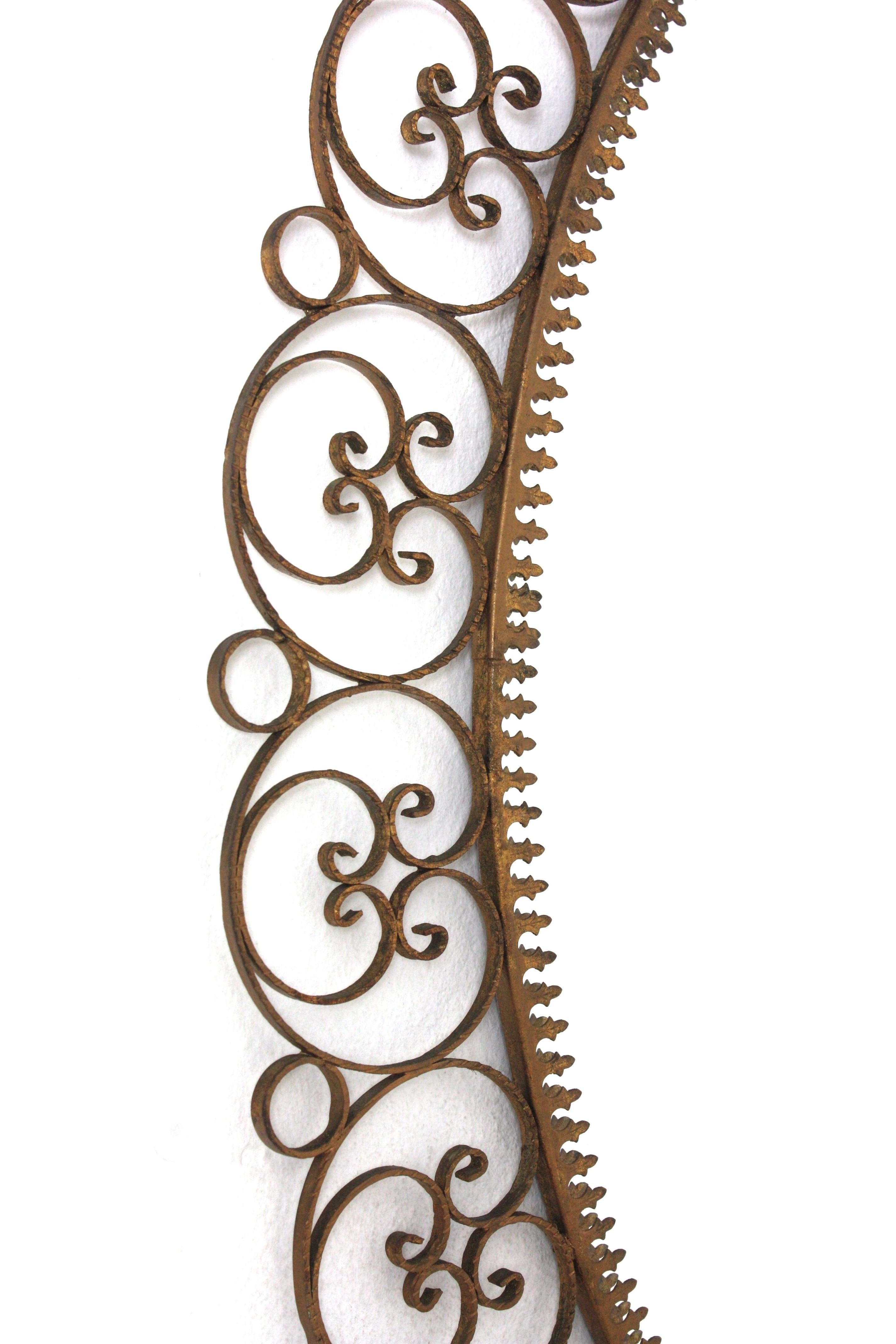 20th Century Spanish Oval Mirror in Gilt Iron with Scrollwork Frame For Sale