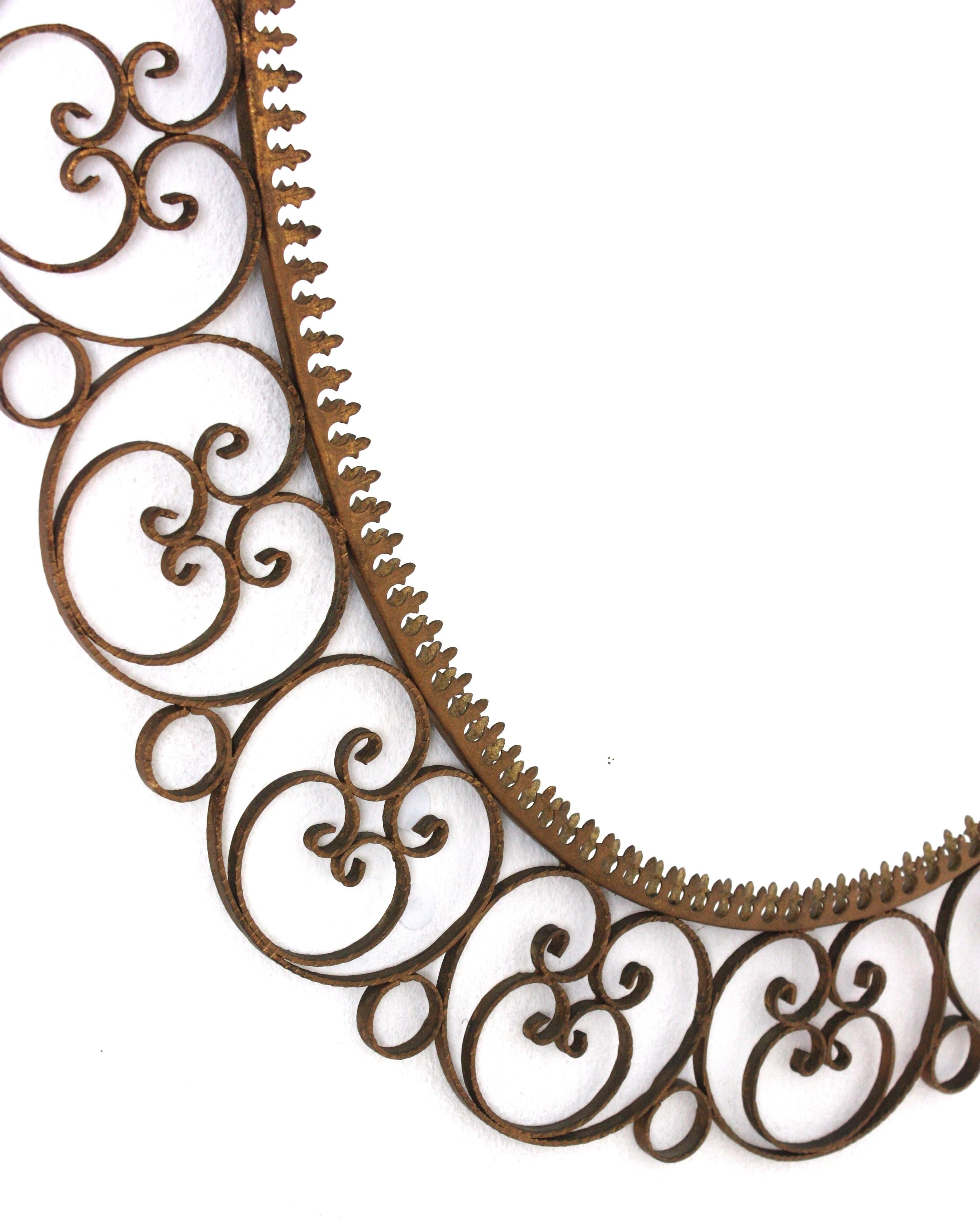 Metal Spanish Oval Mirror in Gilt Iron with Scrollwork Frame For Sale