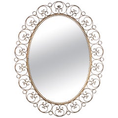 Spanish Oval Mirror in Gilt Iron with Scrollwork Frame