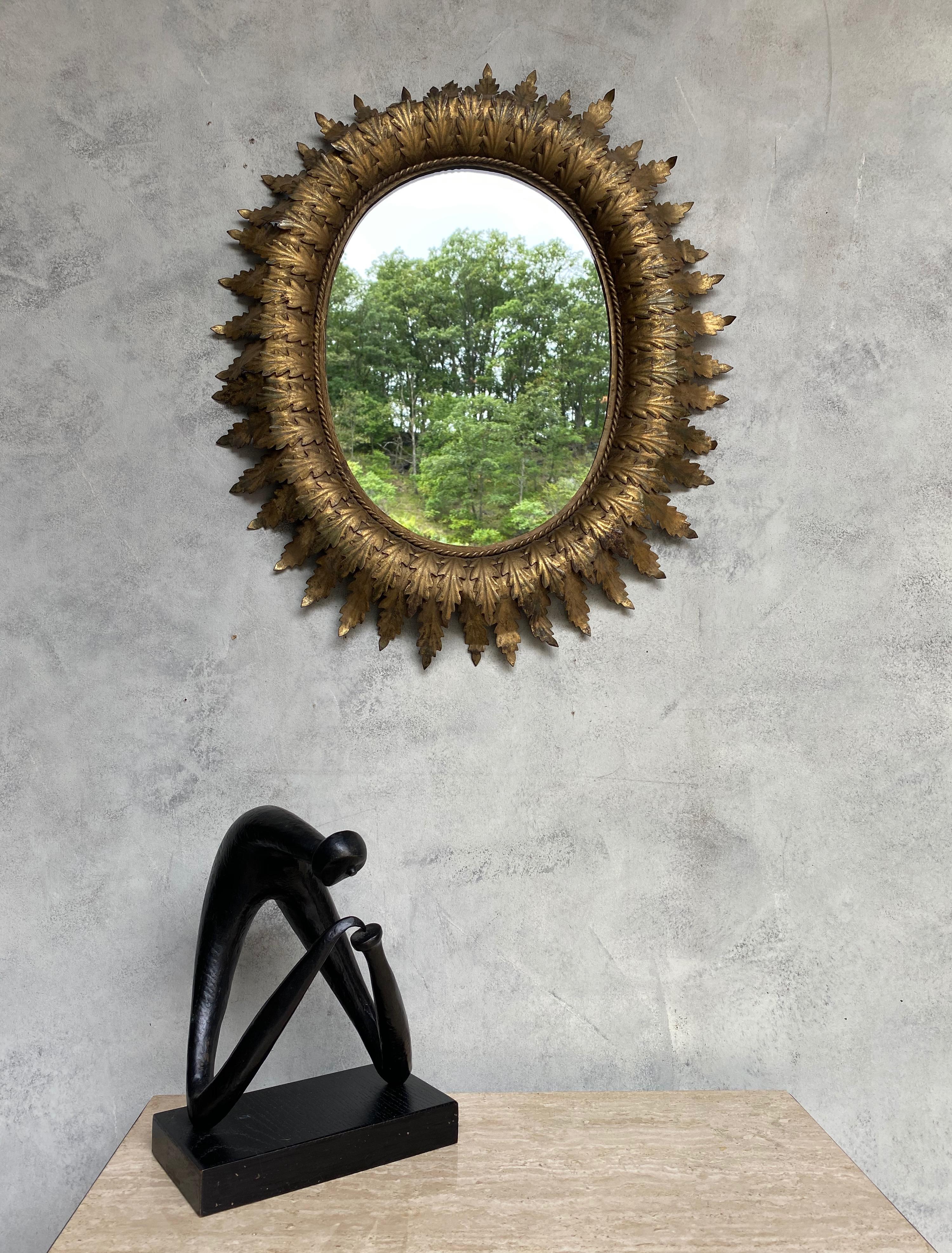 Mid-20th Century Spanish Oval Sunburst Mirror with Double Layered Leaves For Sale