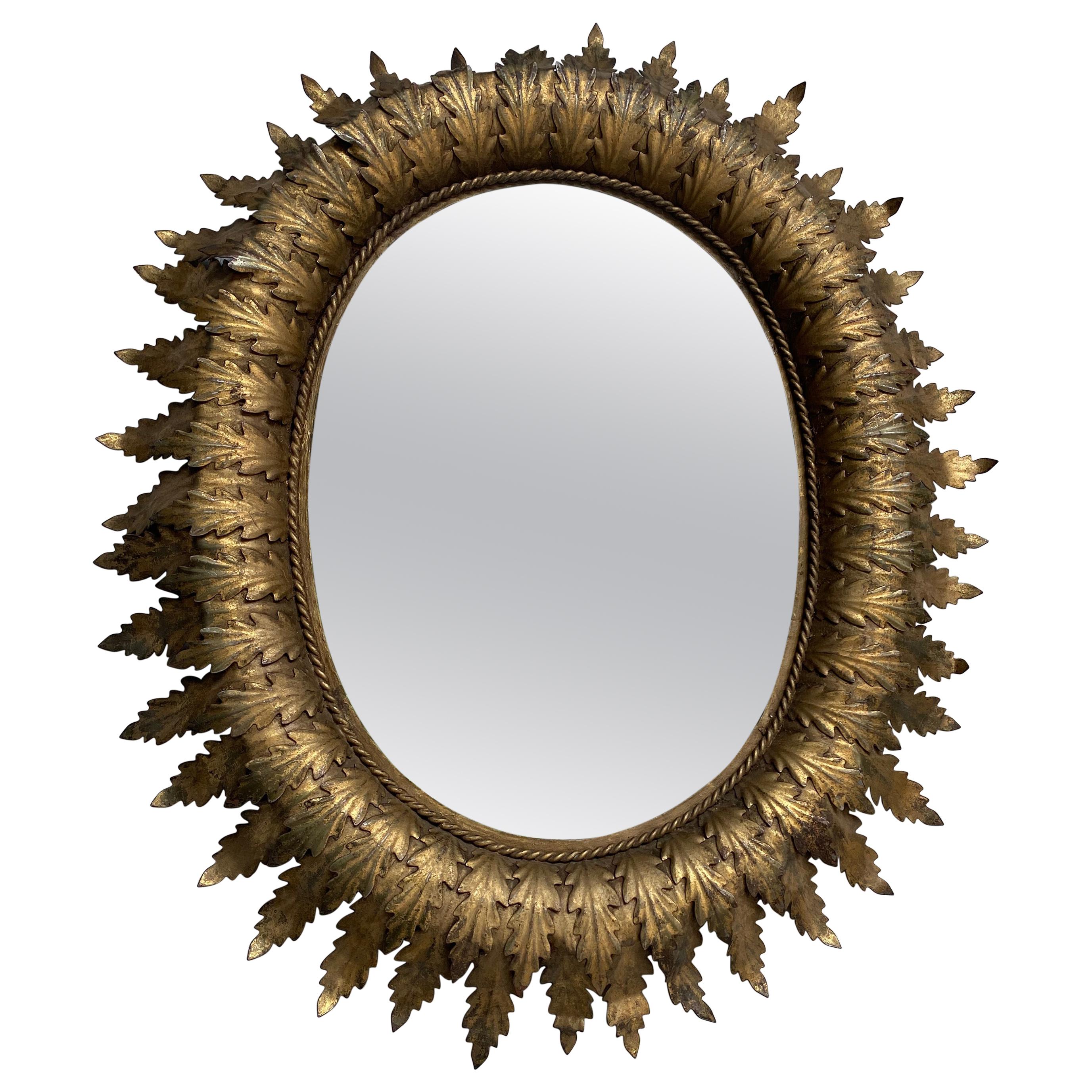 Spanish Oval Sunburst Mirror with Double Layered Leaves For Sale