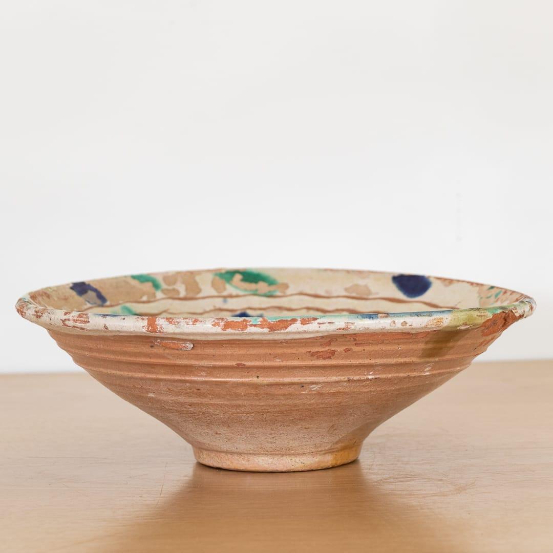 Stunning terracotta bowl from Spain, 1960's. Beautiful blue and green painted detail with etched fish design and etched wavy edge detailing. Great vintage condition. Can be hung on a wall or flat on a table for display. 