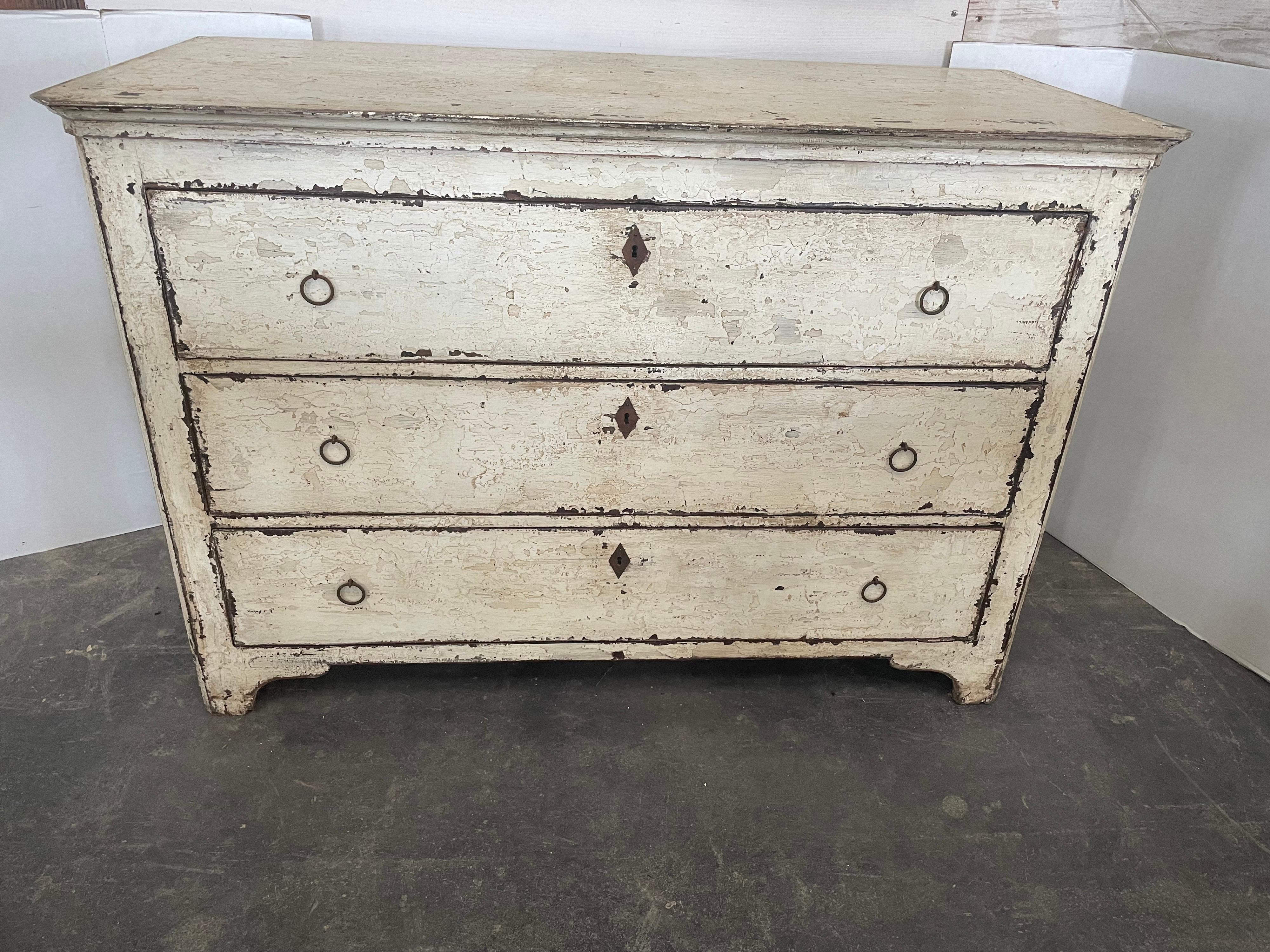 This chest is is of Spanish origin, made from antique buffets, chests and newer wood . The paint is newly done with the layering technique using several colors for dimension and depth.