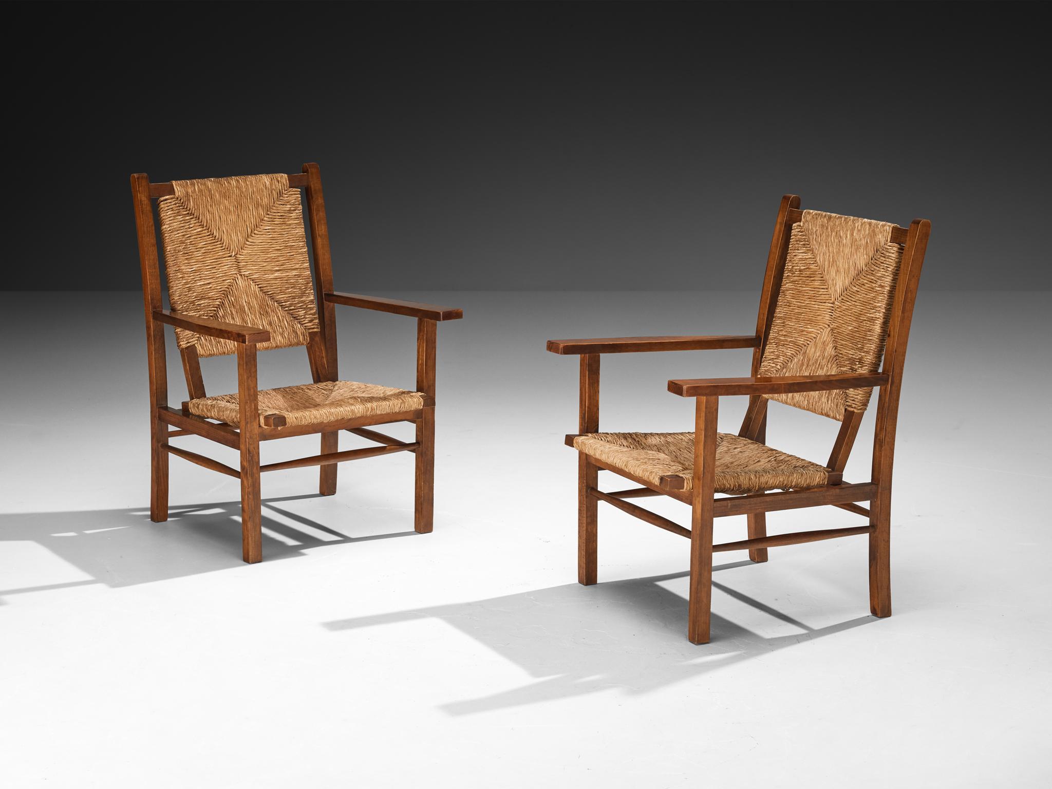 Paar Sessel, Kiefer gebeizt, Stroh, Spanien, 1960er Jahre

Diese wunderschön konstruierten Loungesessel haben einen pastoralen Charakter und sind von großer Qualität und Eleganz. Der Holzrahmen weist eine solide, offene Konstruktion mit geraden