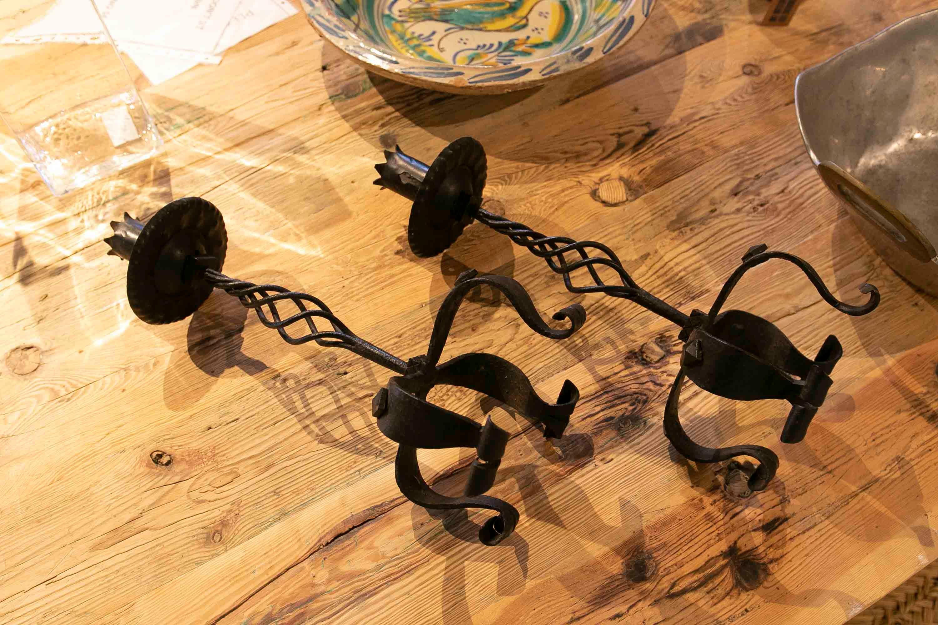Spanish Pair of Iron Candlesticks with Four Legs For Sale 7