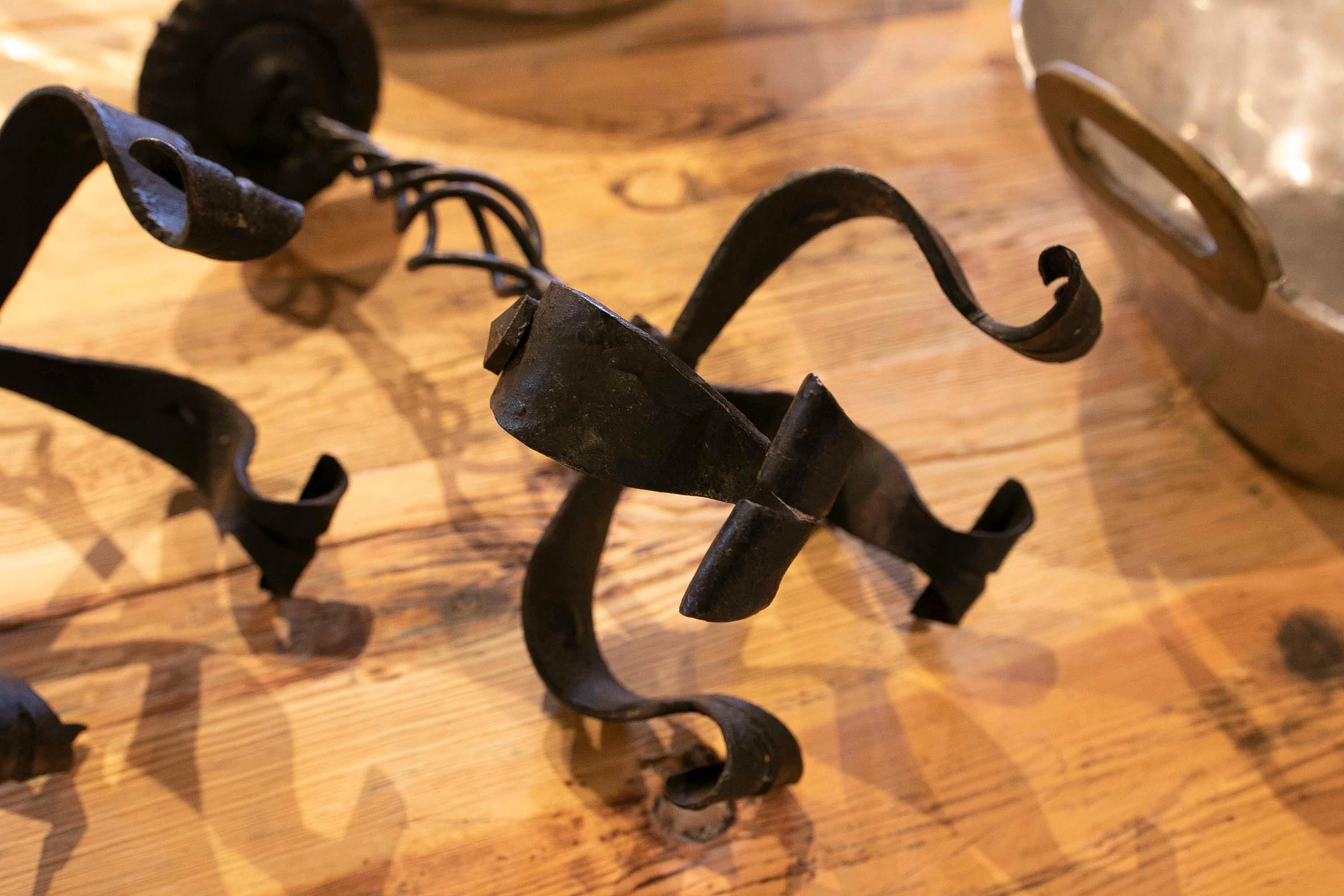 Spanish Pair of Iron Candlesticks with Four Legs For Sale 9