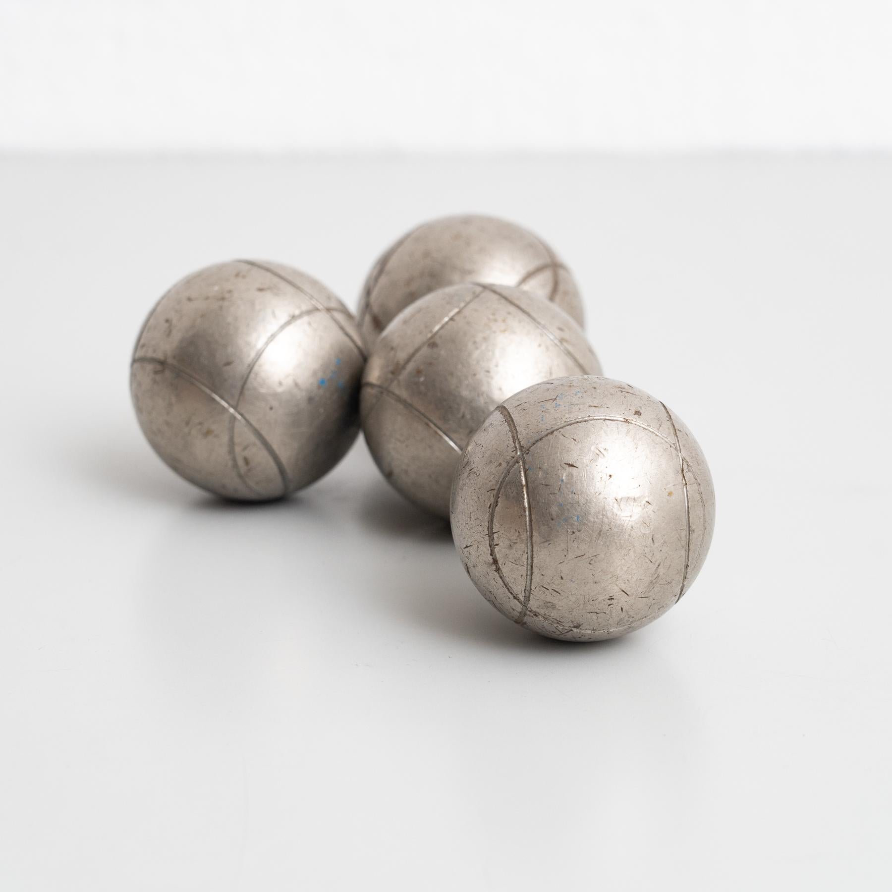 Spanish Petanque Balls - Early 20th Century Set

Discover the timeless charm of our set of four Spanish petanque balls, crafted in the early 20th century around 1940. This exquisite set is in perfect condition, showcasing the craftsmanship and