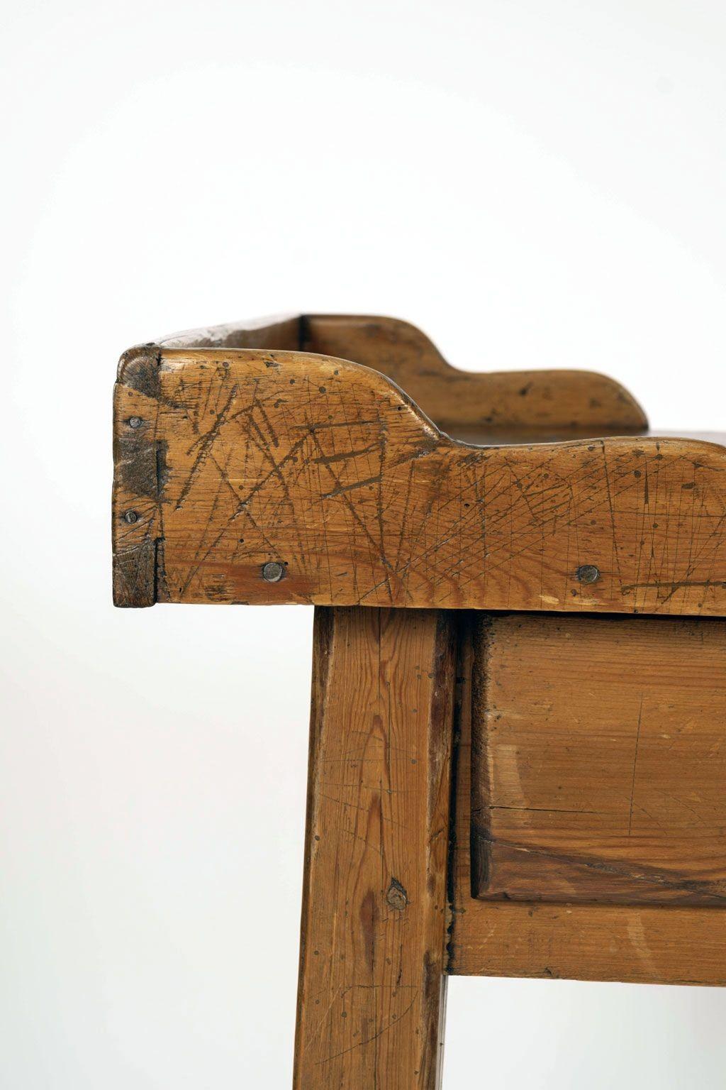 Spanish pine side table in joined construction. Circa 1840-1879. Two drawers with working locks and keys. Early or original drawer interiors. Partial gallery surround with dovetailed corners. Originally used as a writing table or work/kitchen