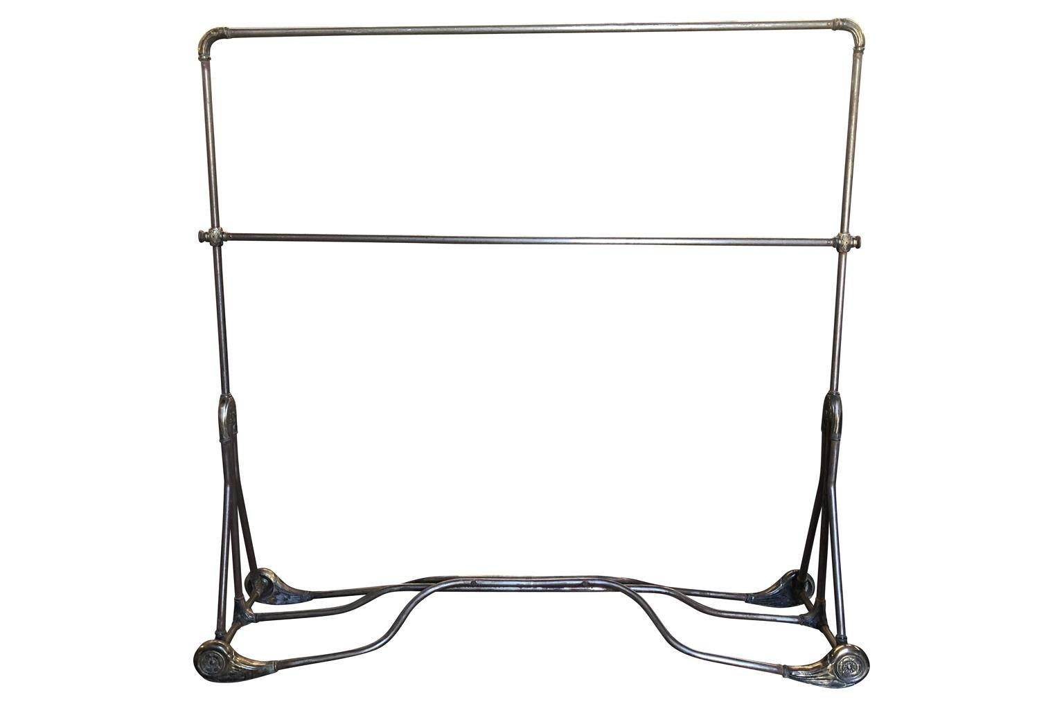 An exceptional and rare late 19th-early 20th century Porte Manteau, coat rack, garment rack from Barcelona. A sensational piece - soundly constructed from metal in the Art Nouveau style. Perfect for a loft foyer, large master closet, restaurant or