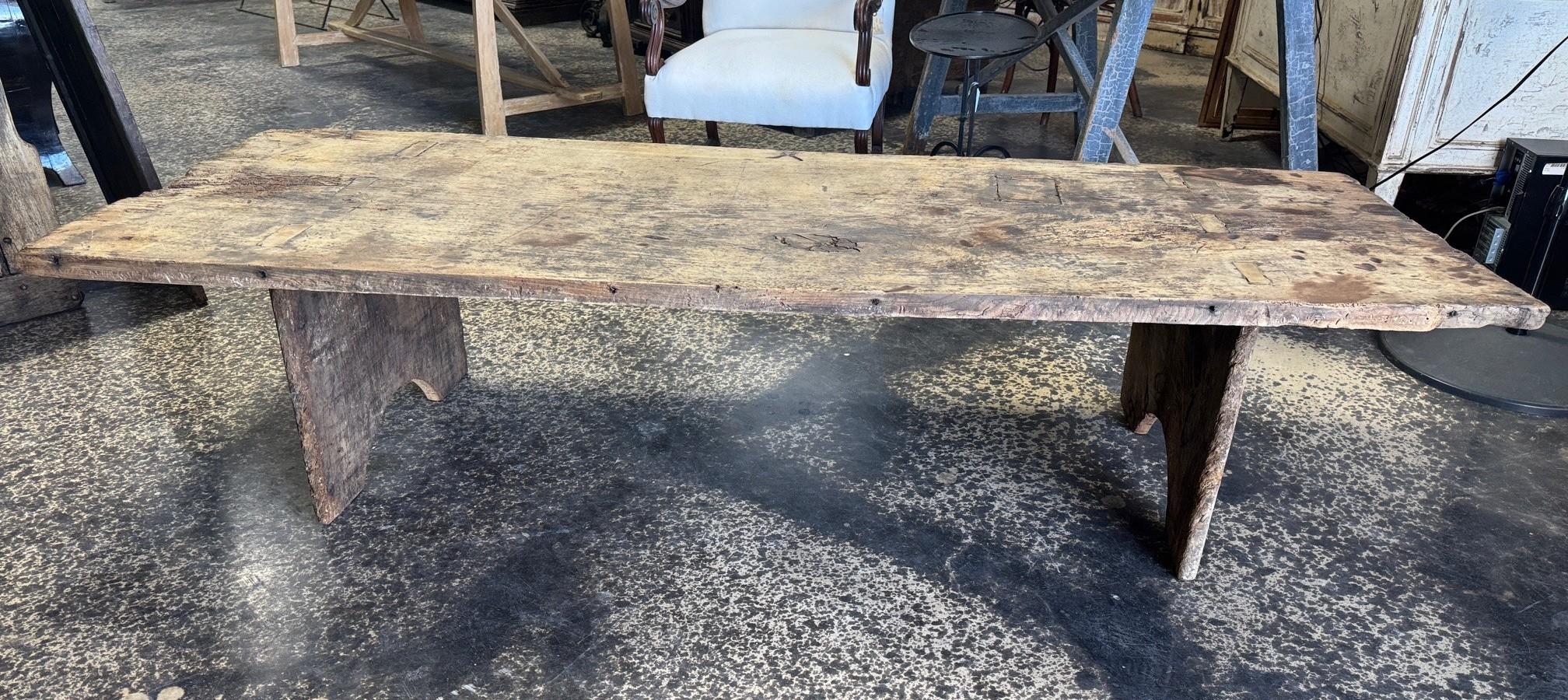 A wonderful primitive Coffee Table - Table Basse from the Catalan region of Spain.  Nicely constructed from 17th century chestnut solid board planks.  Great patina with very minimalist lines. 