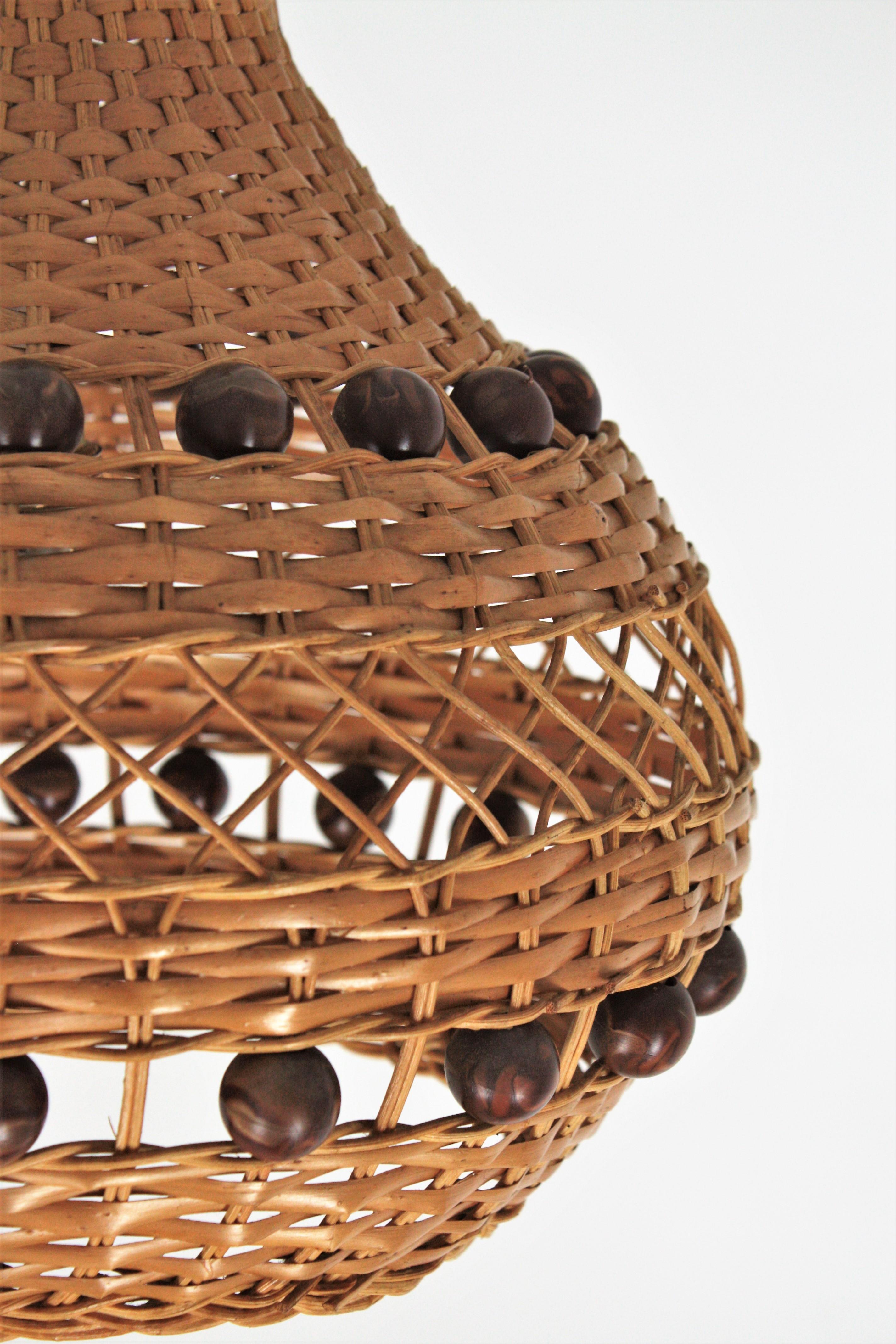 Spanish Rattan Pendant Light / Lantern with Balls Accents In Good Condition For Sale In Barcelona, ES